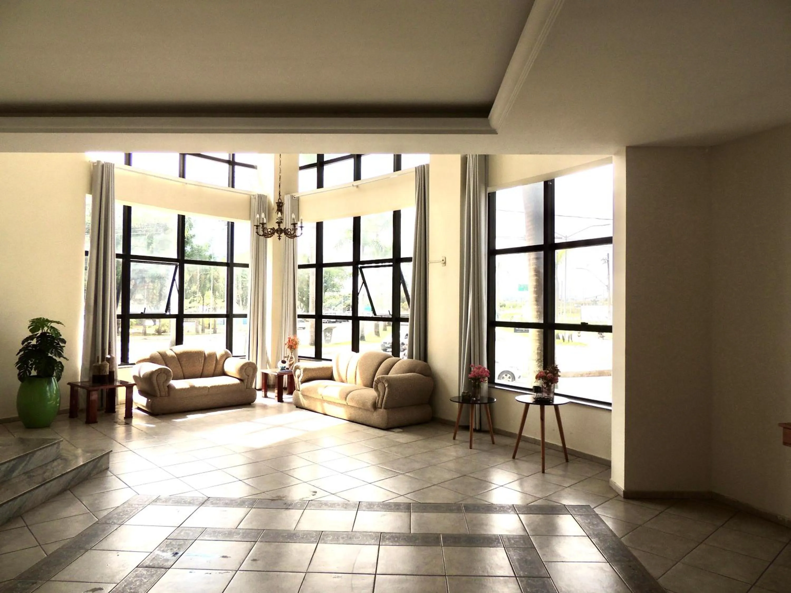 Lobby or reception in Pouso Alegre Hotel