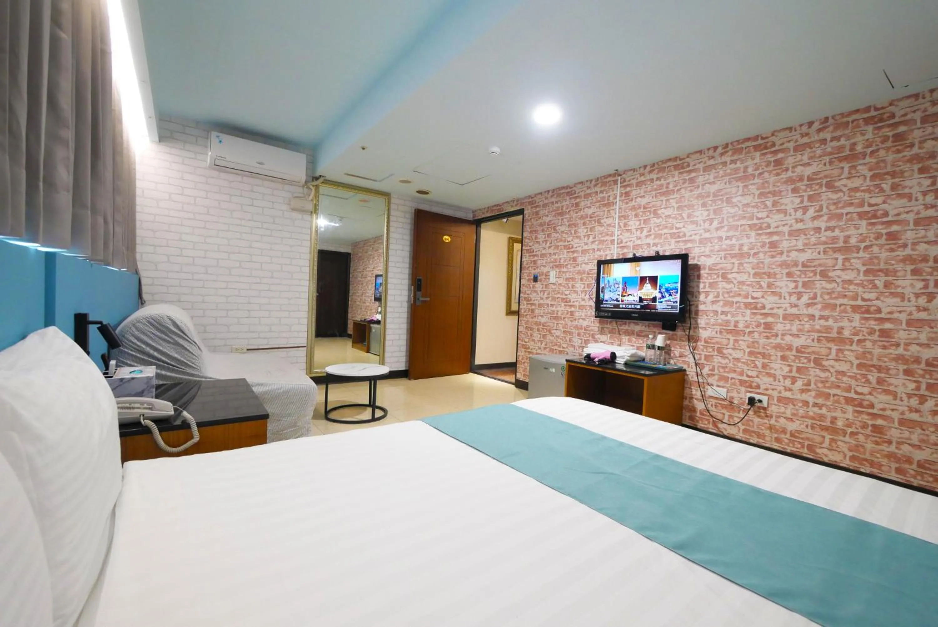 Bed in I Hi Loveriver Hotel