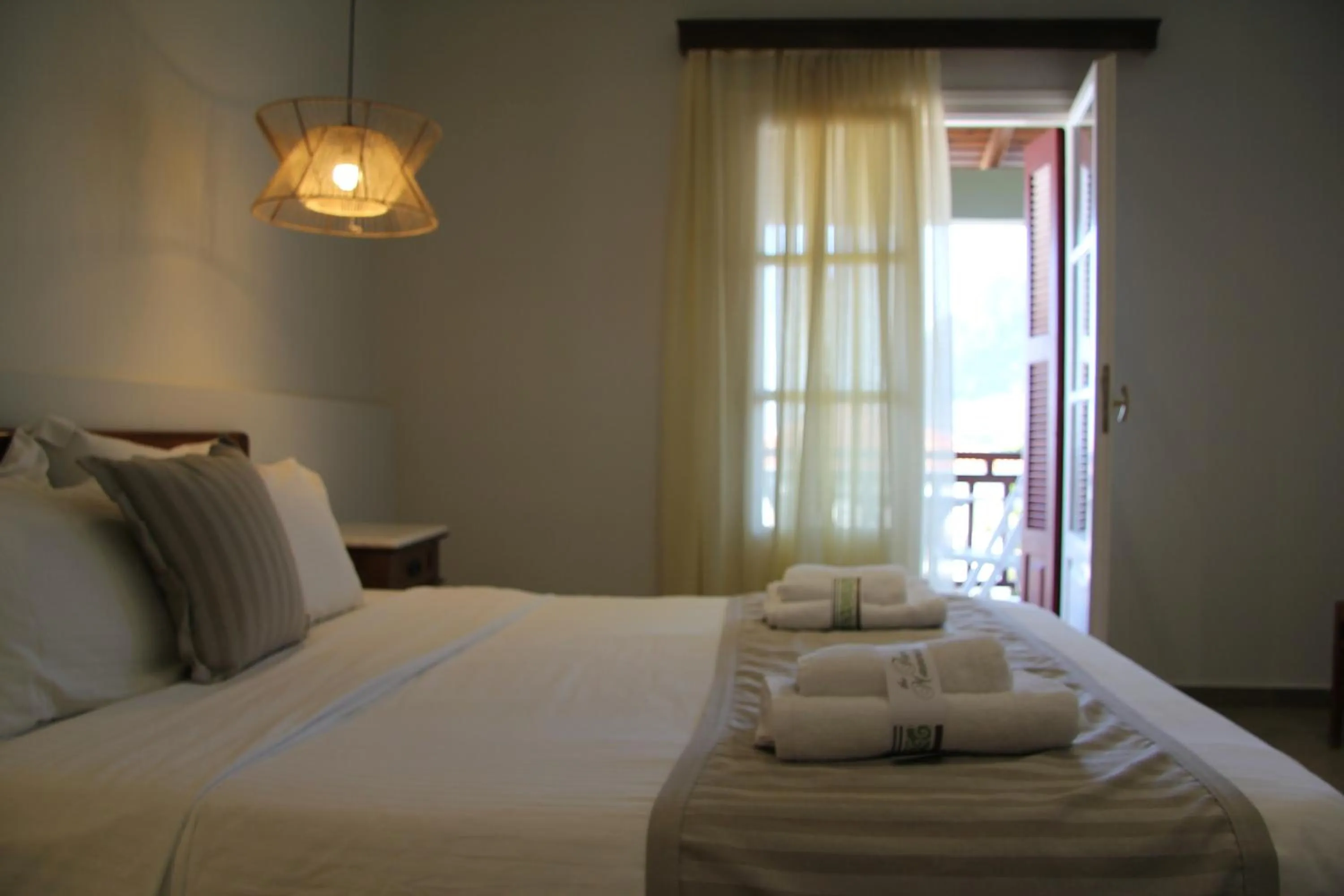 Bed in The Flower Of Monemvasia Hotel