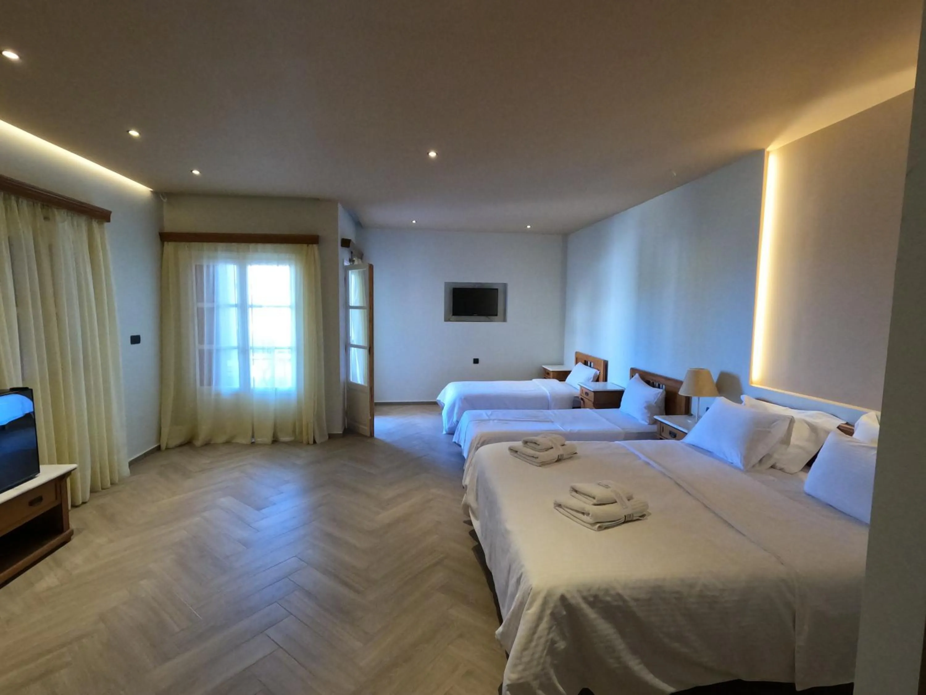 Bed in The Flower Of Monemvasia Hotel