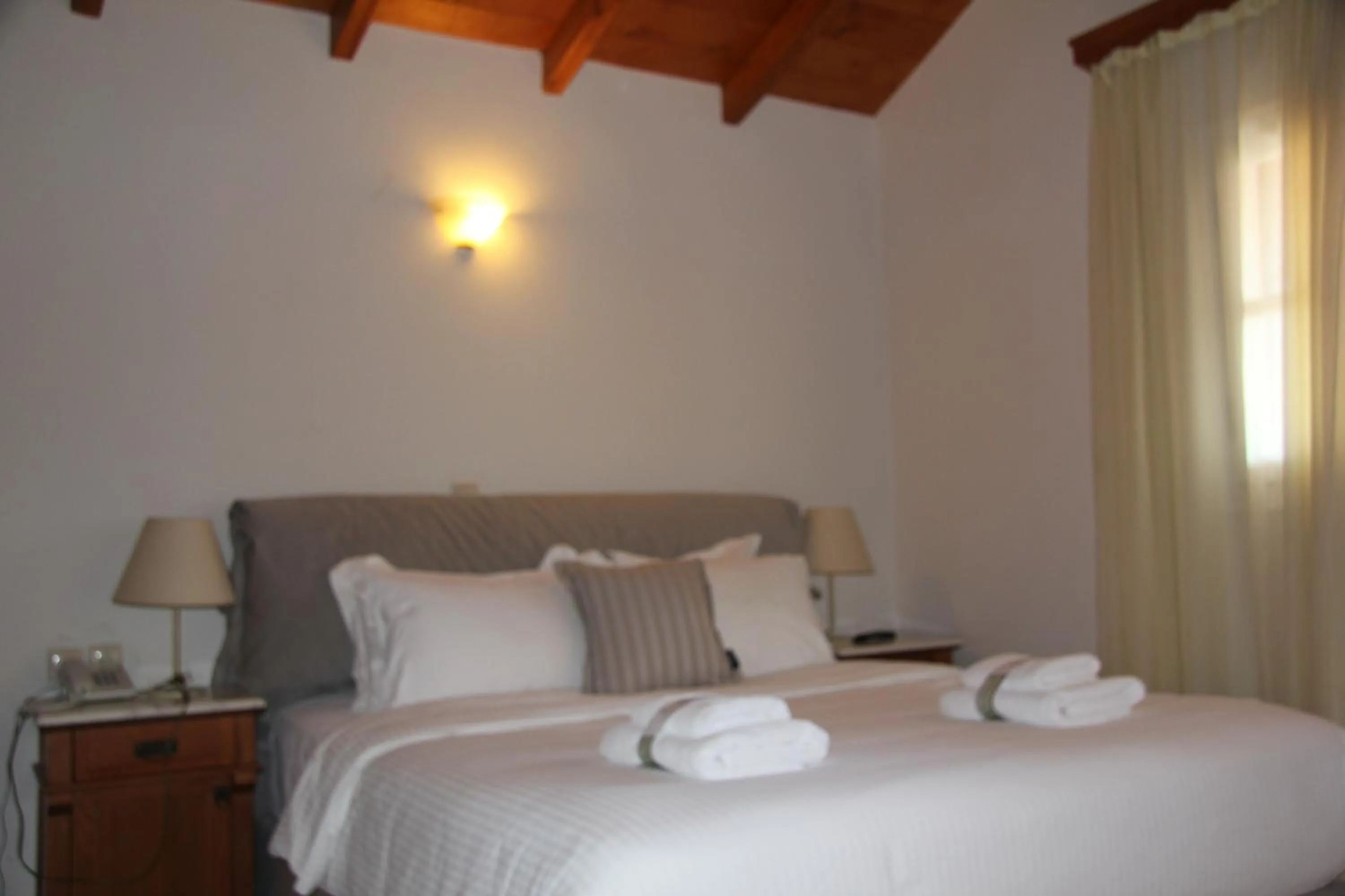 Bed in The Flower Of Monemvasia Hotel