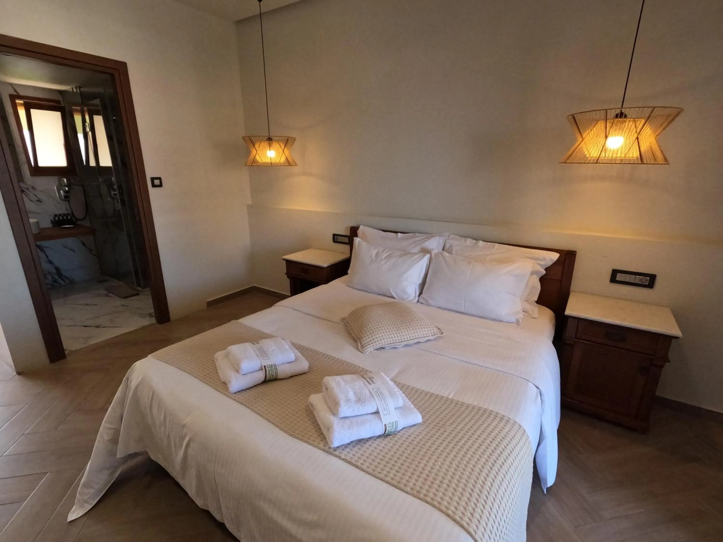 Bed in The Flower Of Monemvasia Hotel