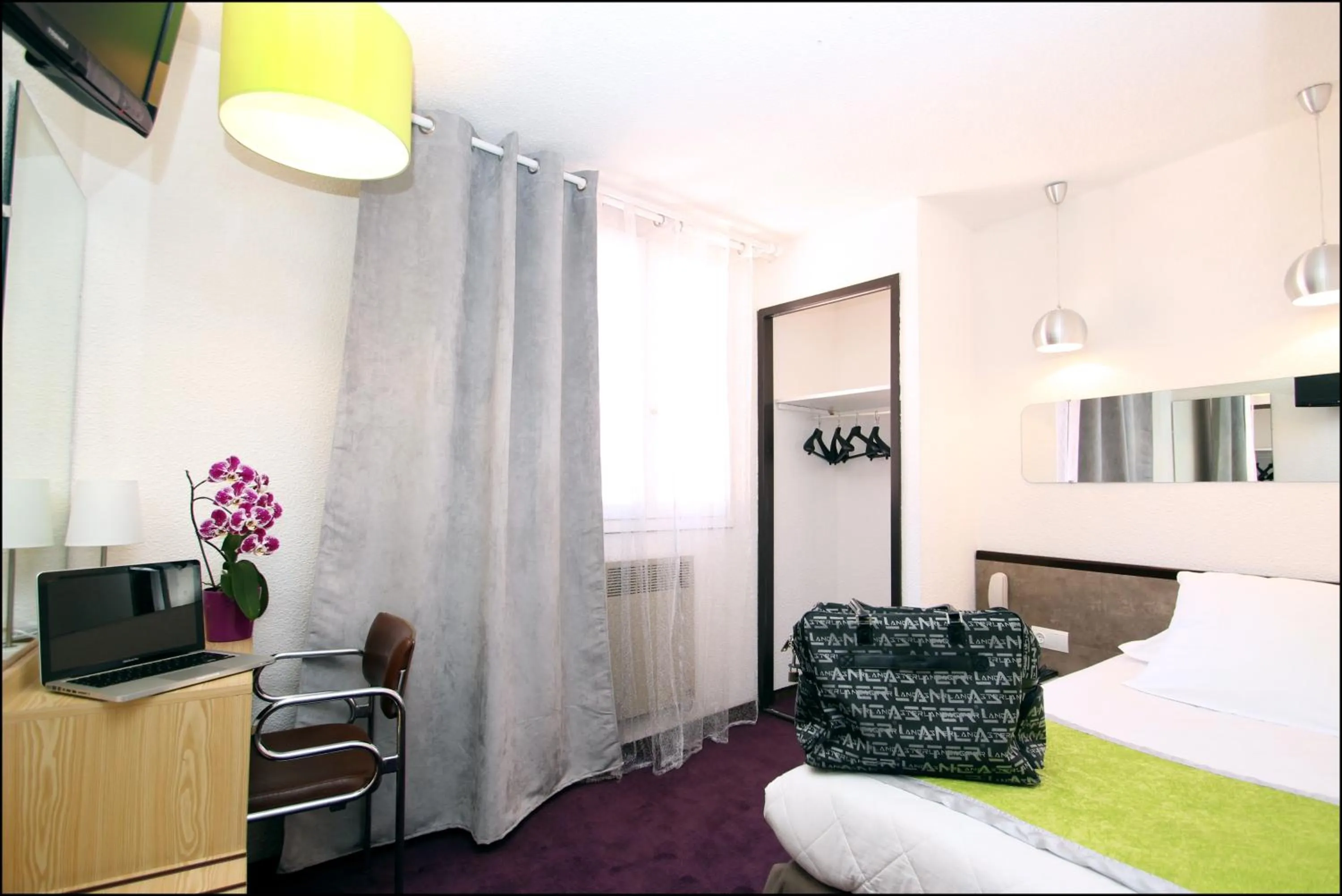 Photo of the whole room, Bed in Hôtel Peyramale