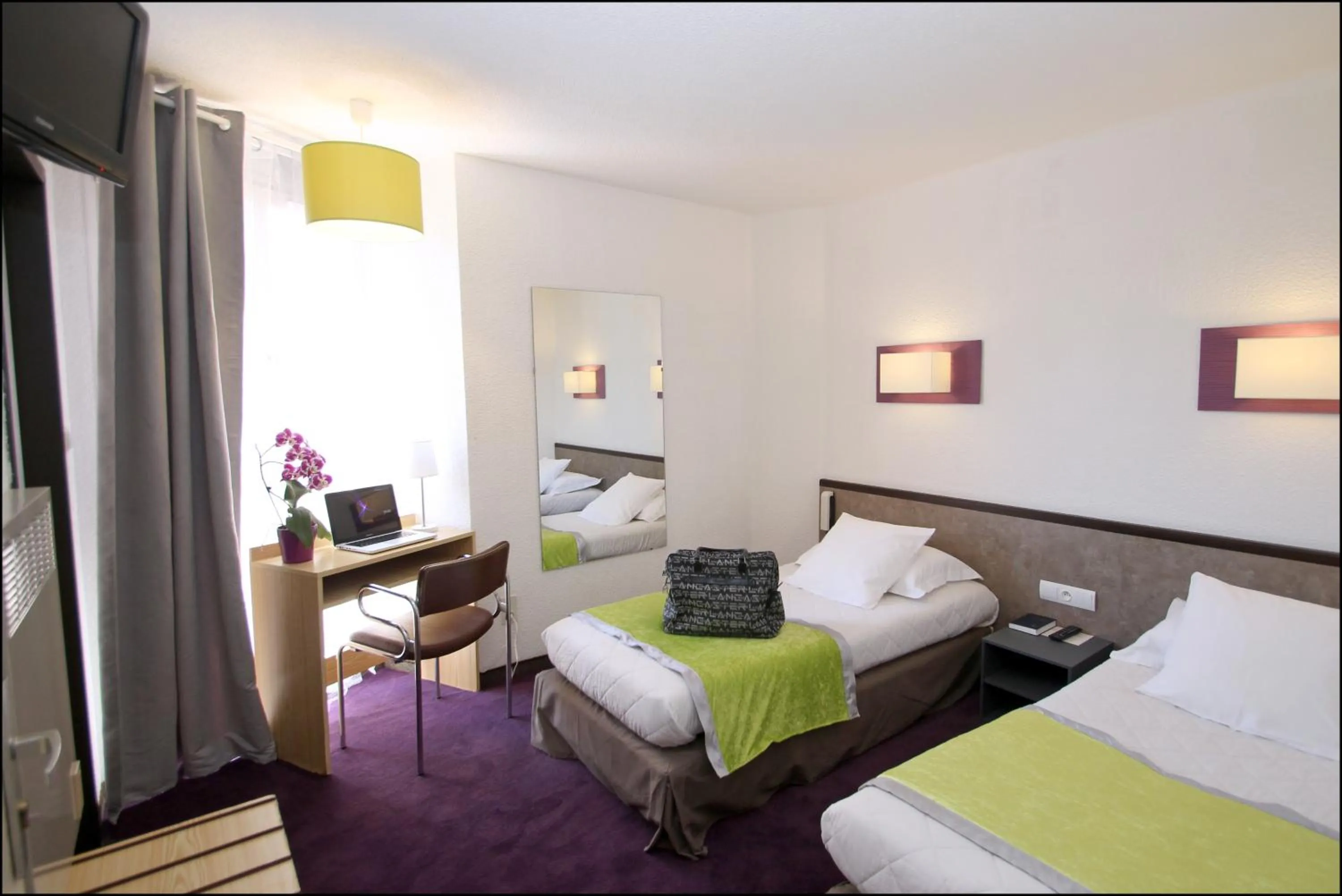 Photo of the whole room, Bed in Hôtel Peyramale