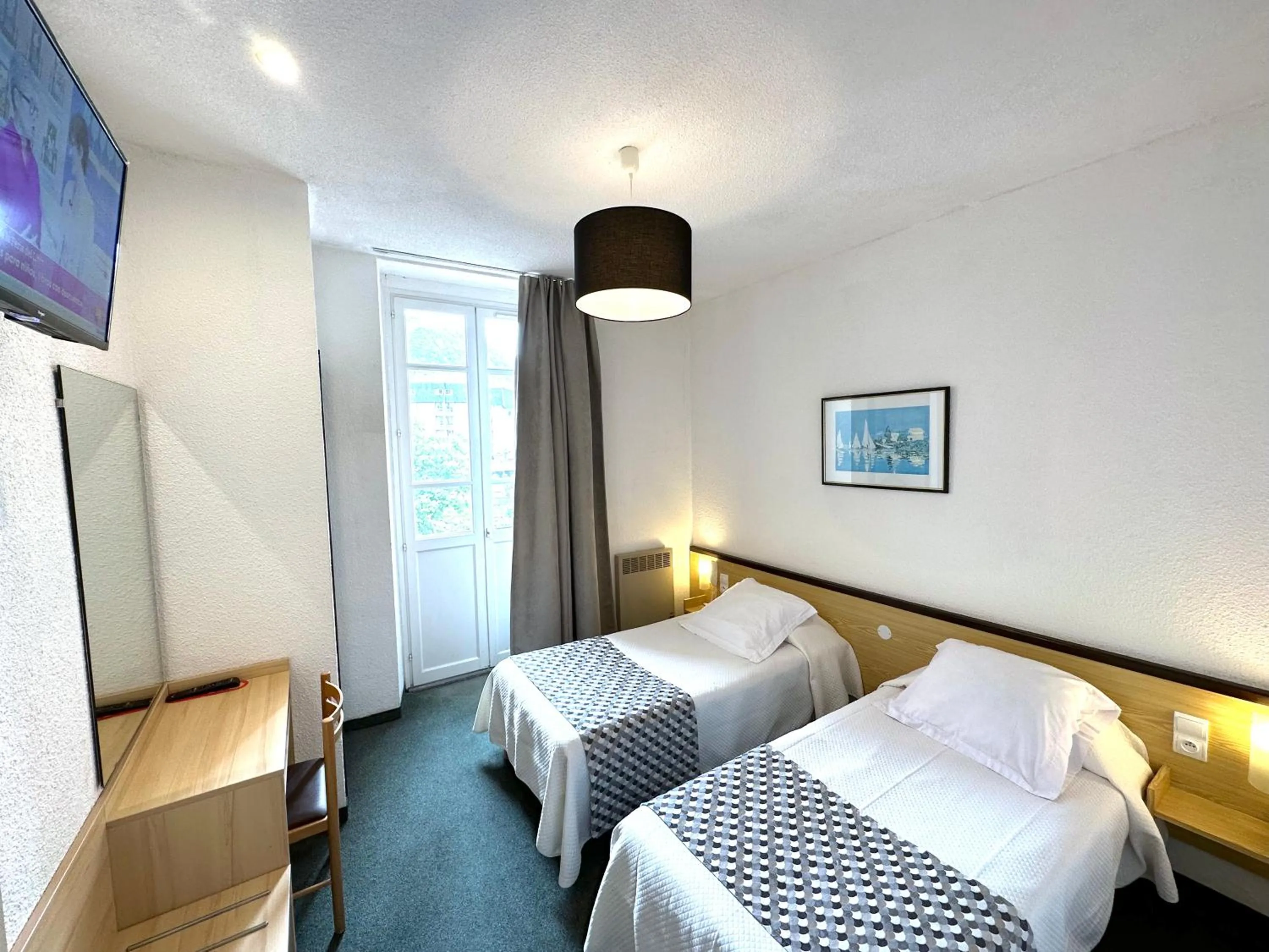 Bed in Hôtel Peyramale