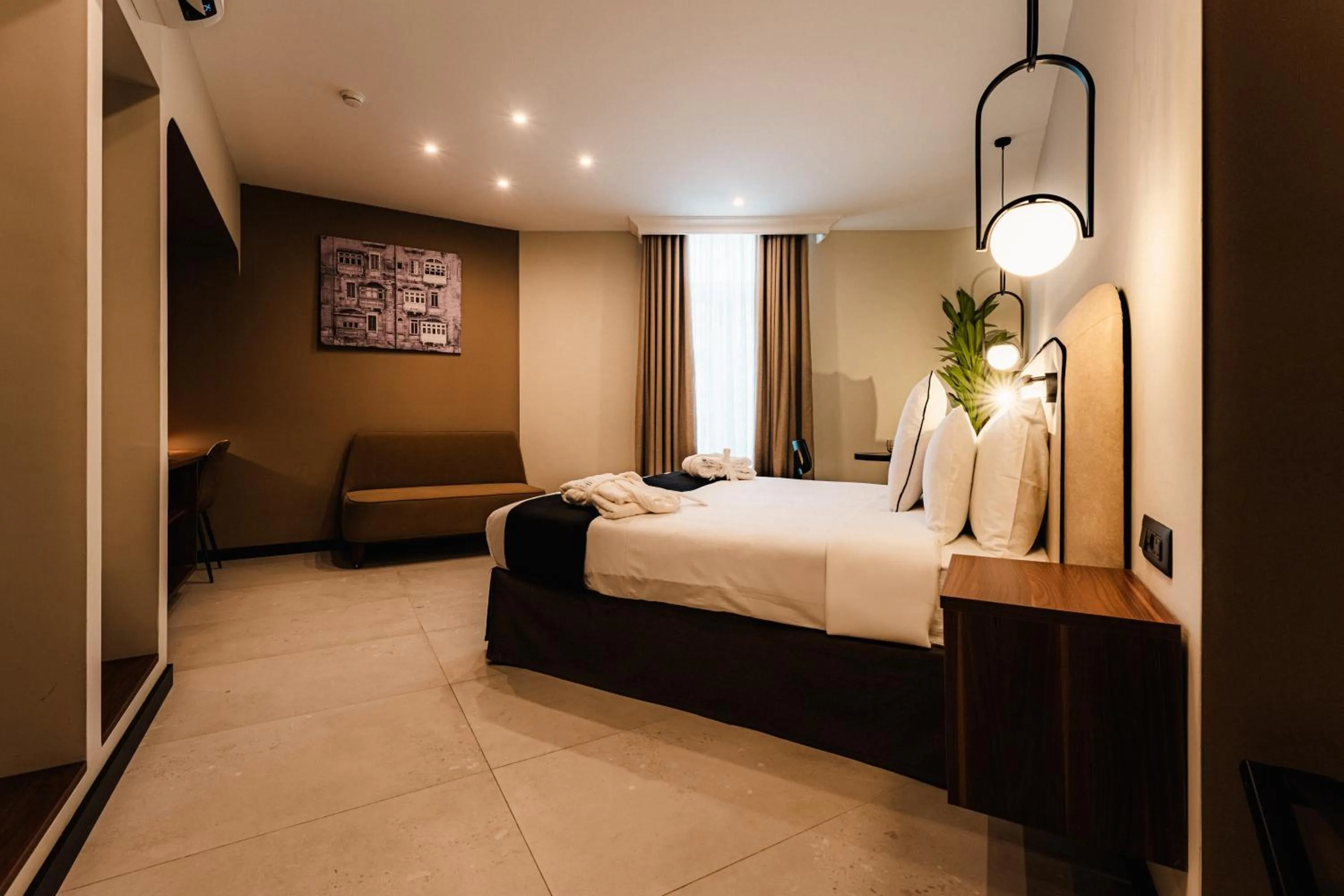 Bed in Royale Sainte Hélène Boutique Hotel