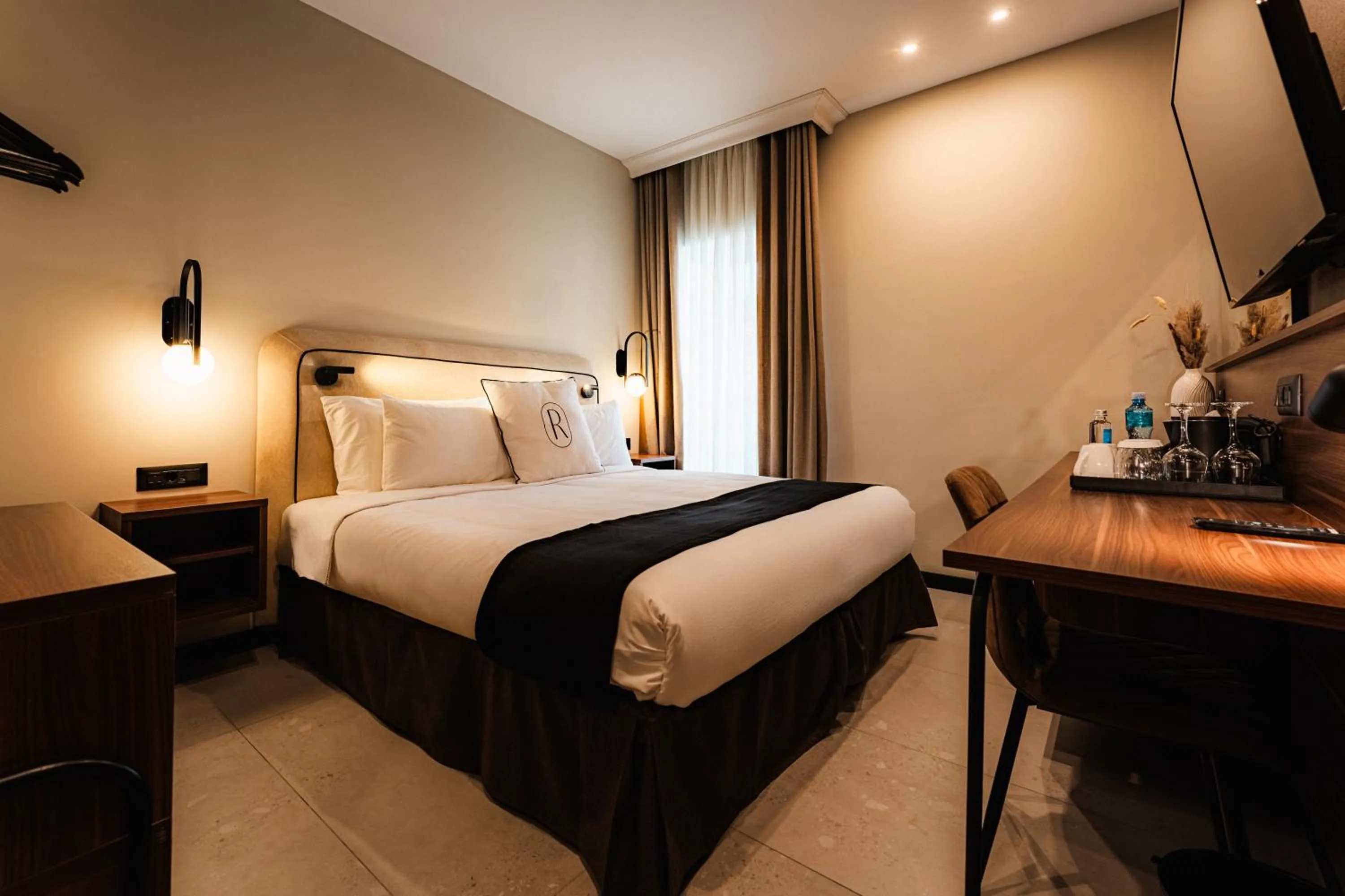 Bed in Royale Sainte Hélène Boutique Hotel