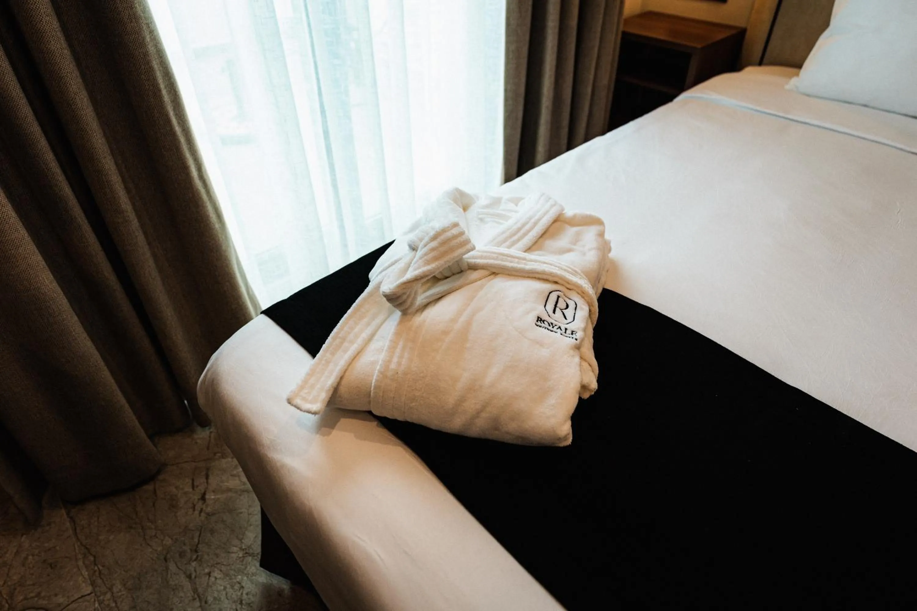 Bed in Royale Sainte Hélène Boutique Hotel