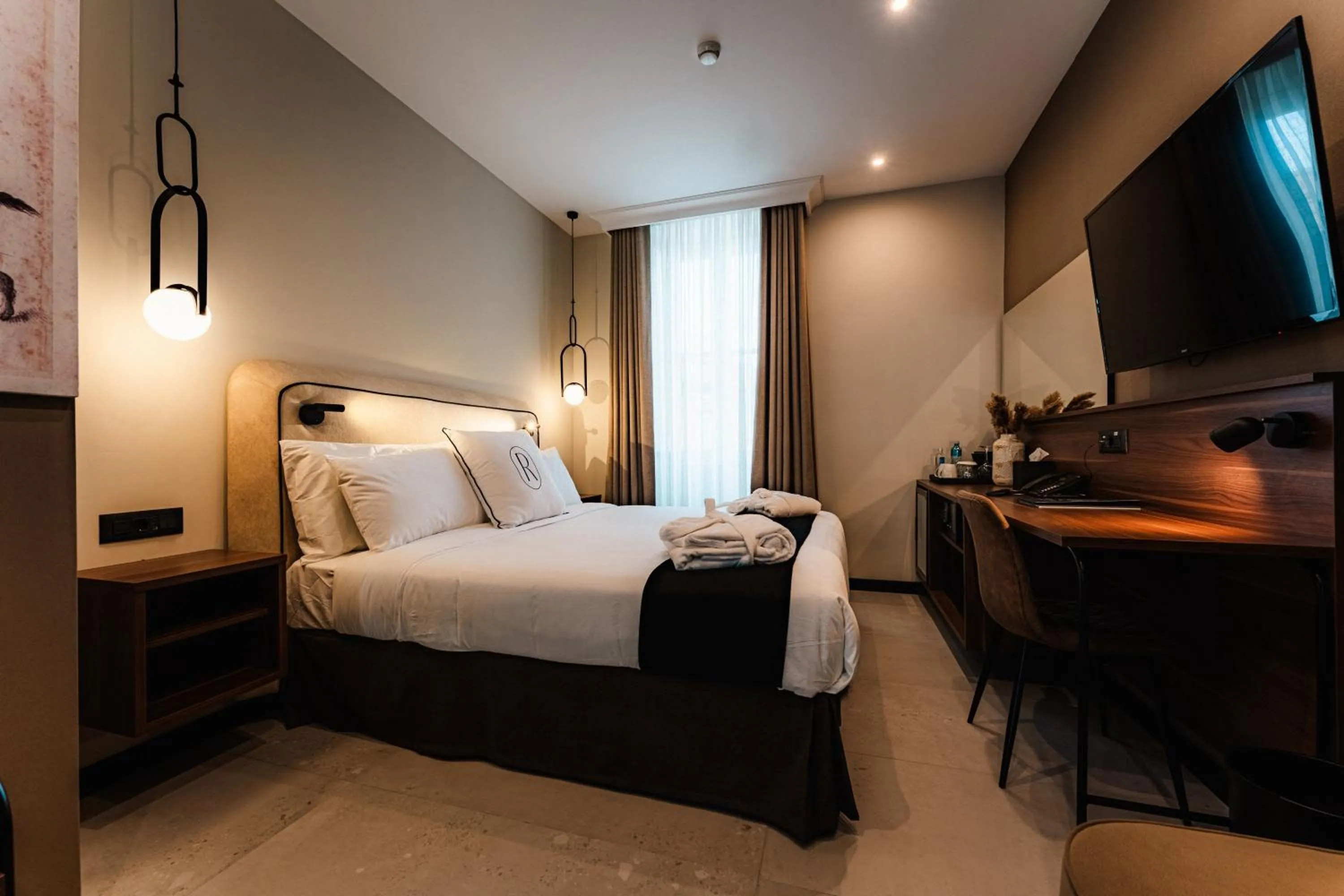 Bed in Royale Sainte Hélène Boutique Hotel