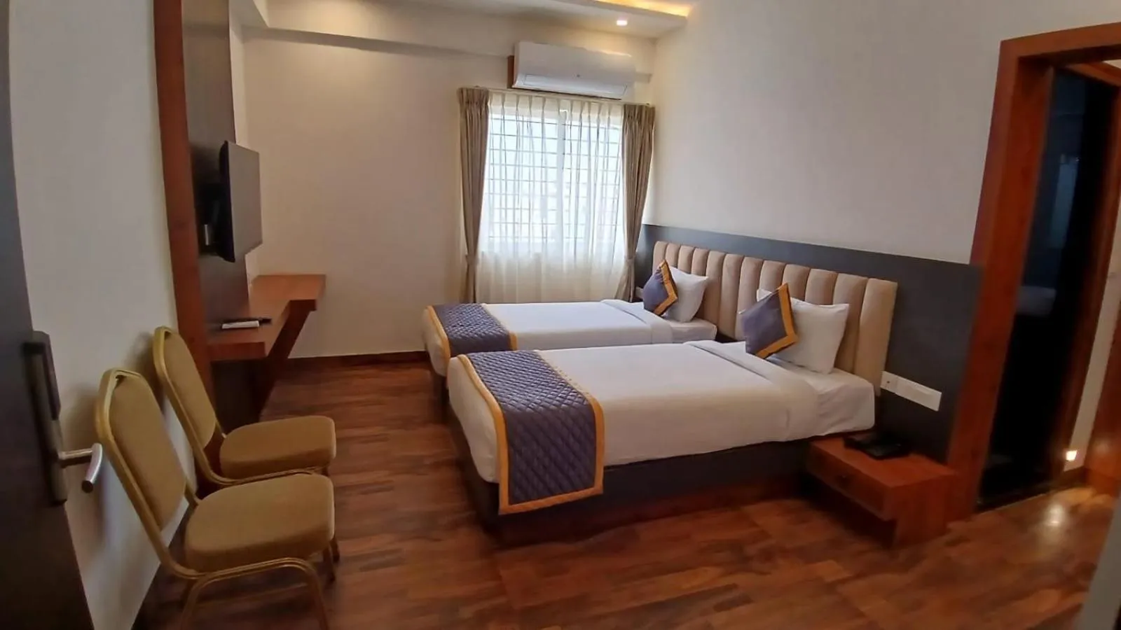 Bed in PPH Living Rajathagiri Palace Premium Rooms