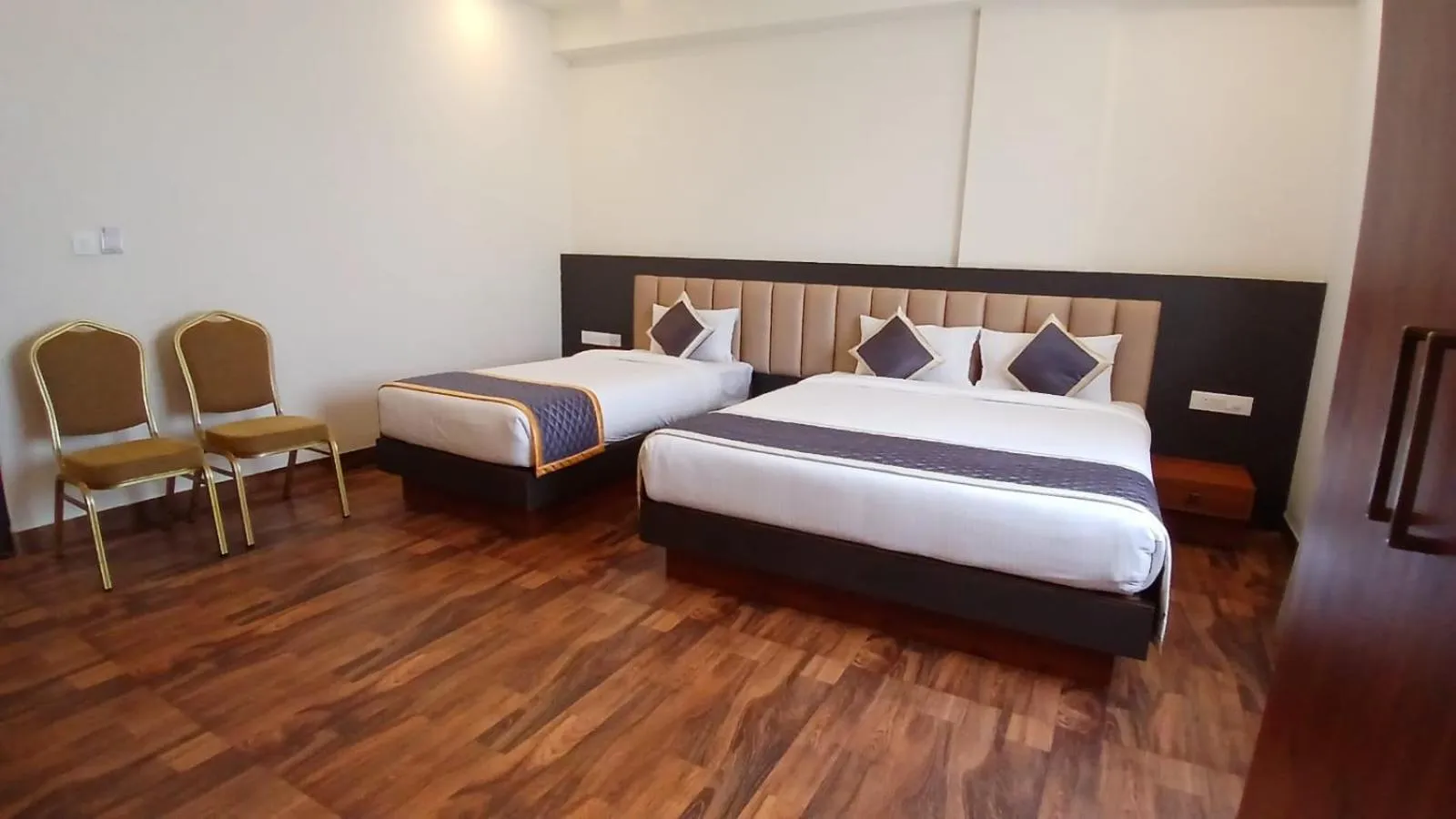 Bed in PPH Living Rajathagiri Palace Premium Rooms