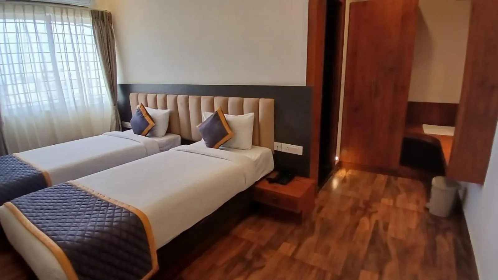 Bed in PPH Living Rajathagiri Palace Premium Rooms