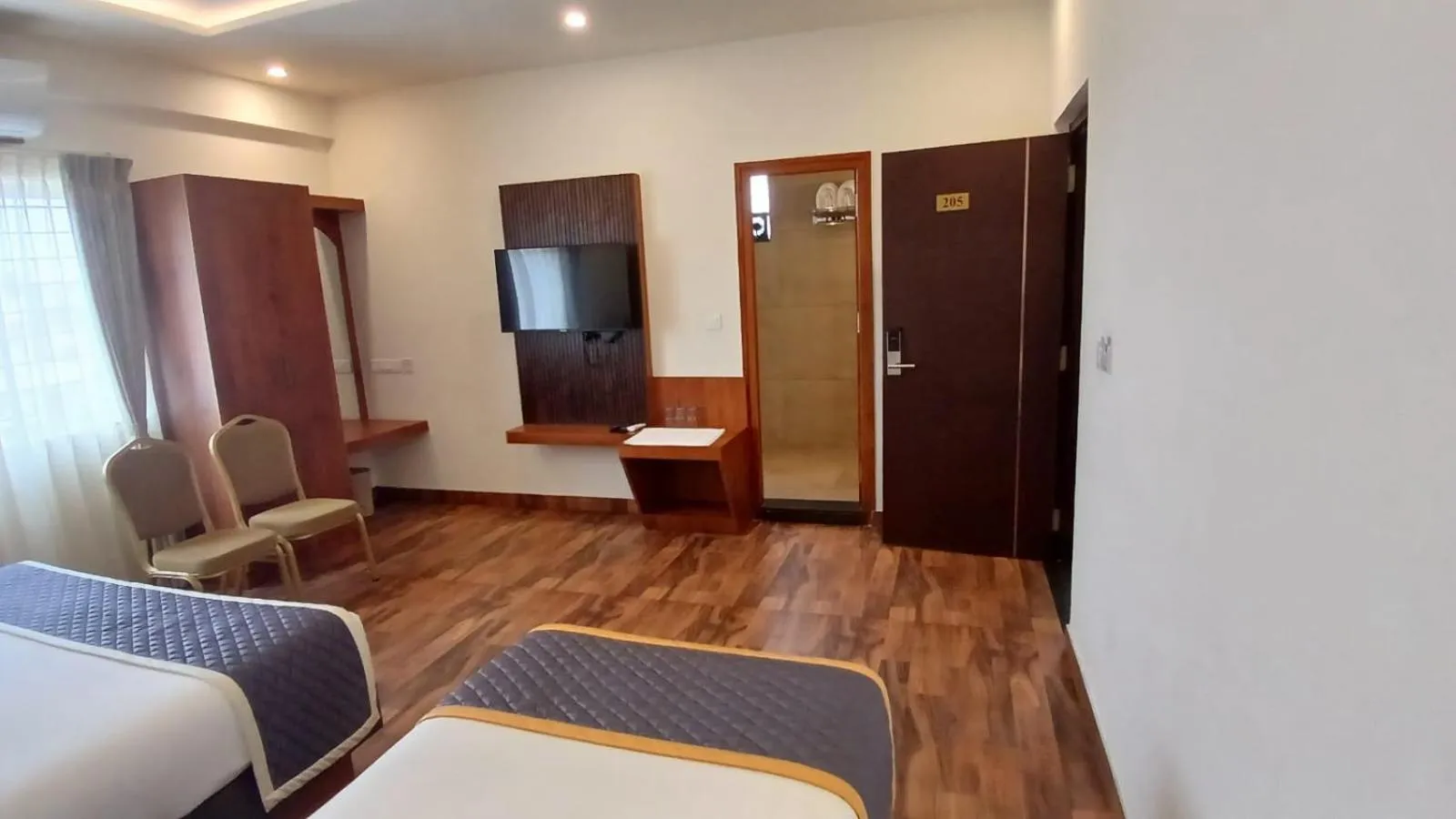 Bed in PPH Living Rajathagiri Palace Premium Rooms