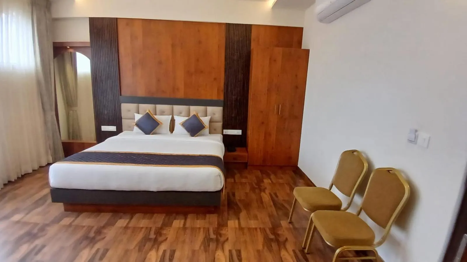 Bed in PPH Living Rajathagiri Palace Premium Rooms