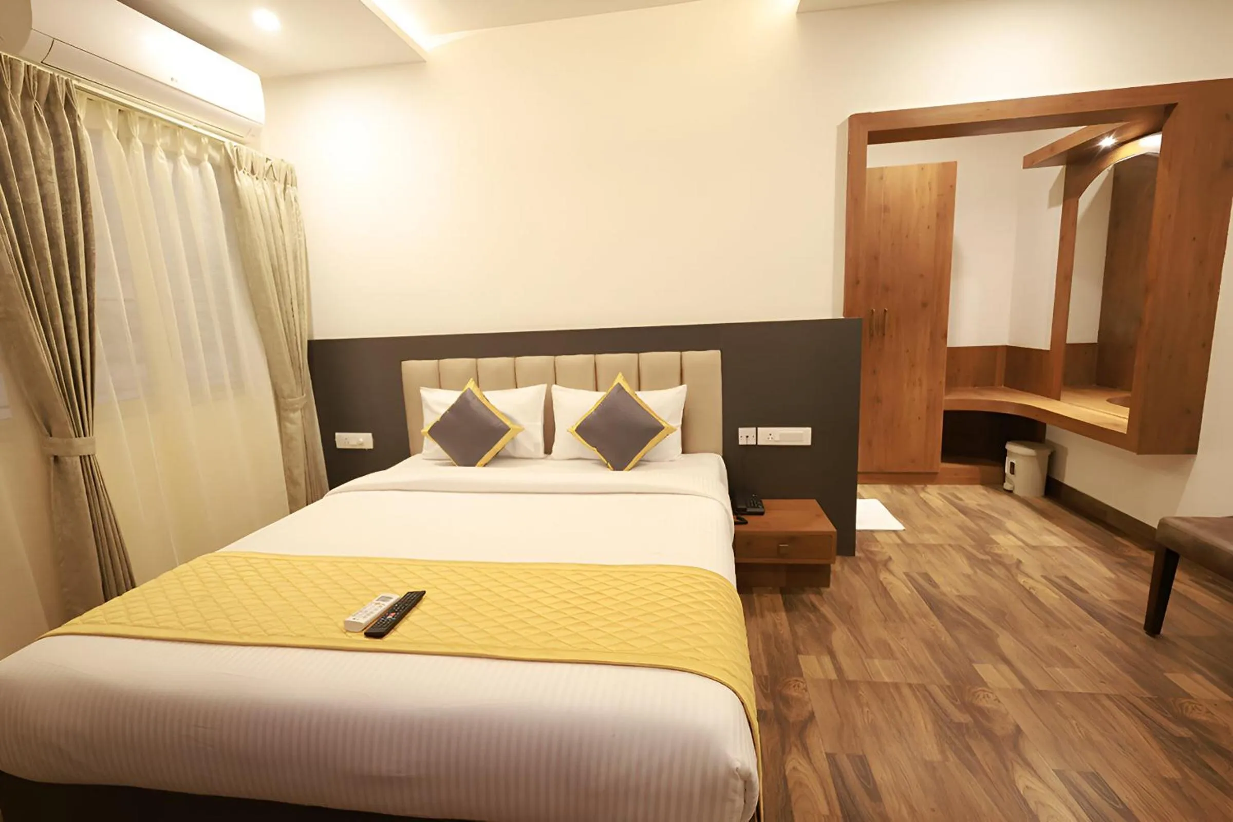 Bed in PPH Living Rajathagiri Palace Premium Rooms