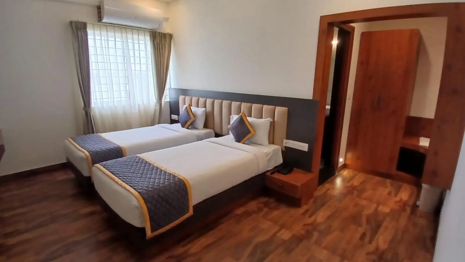 Bed in PPH Living Rajathagiri Palace Premium Rooms