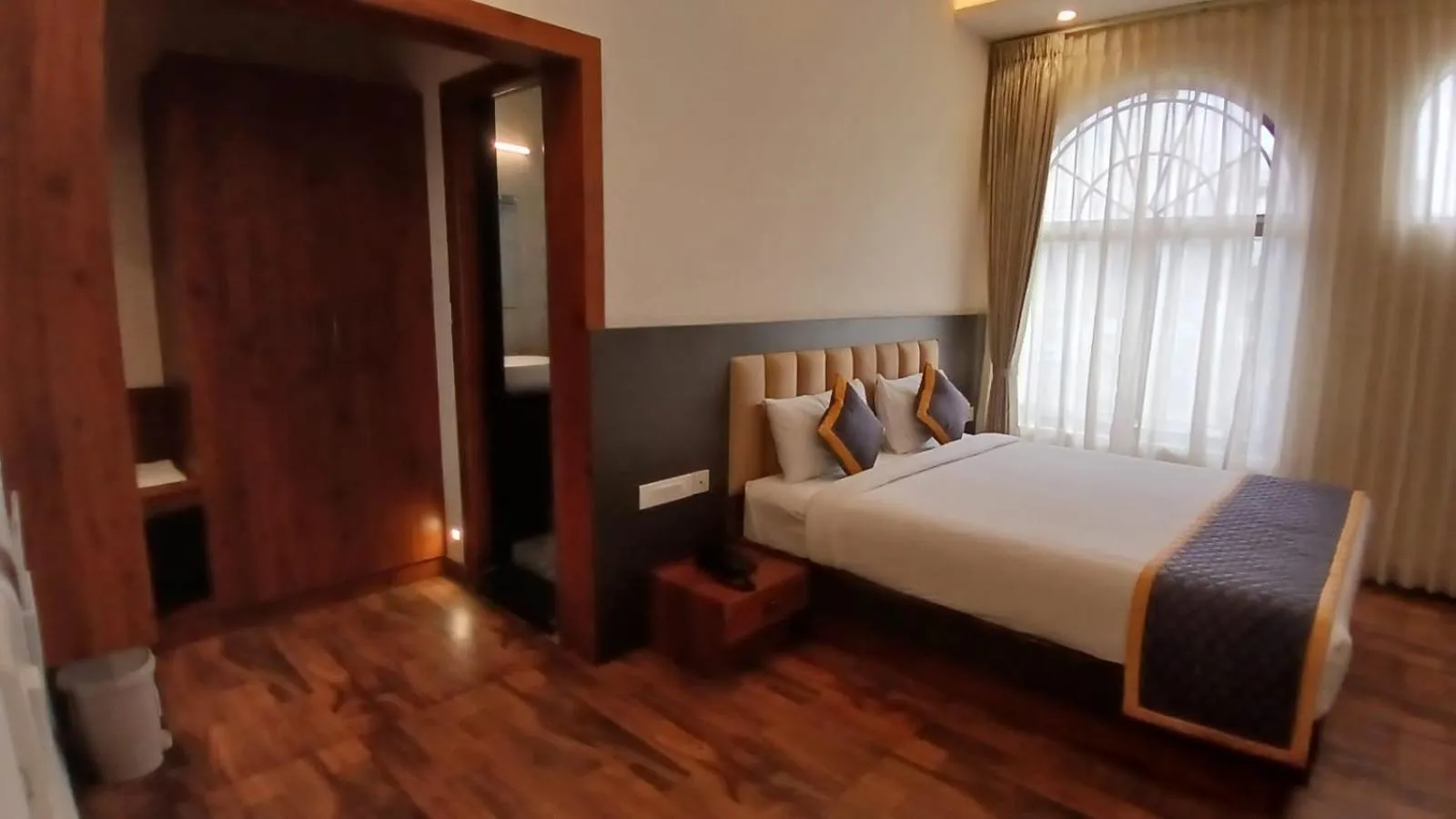 Bed in PPH Living Rajathagiri Palace Premium Rooms