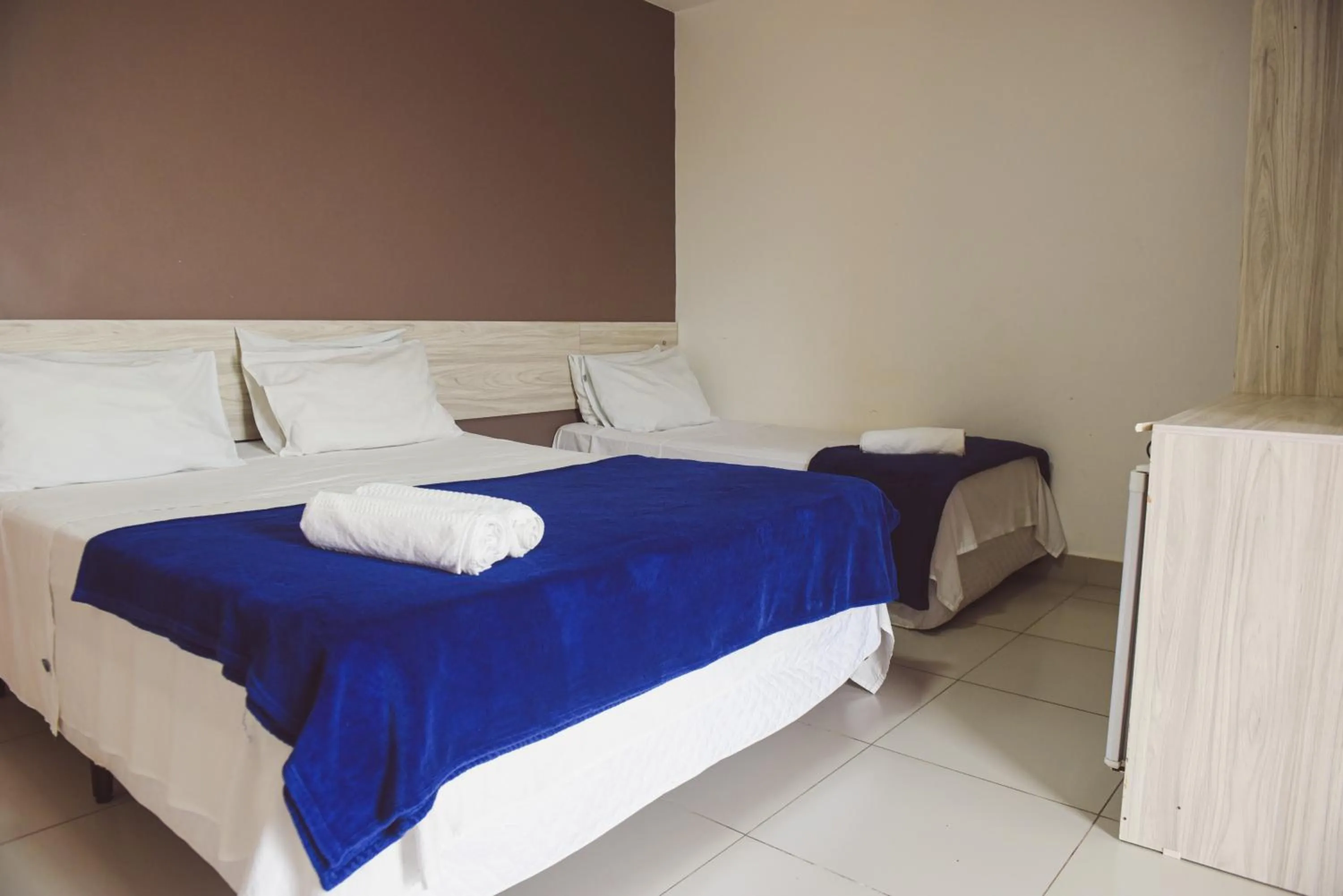 Bed in Pousada Xerxes