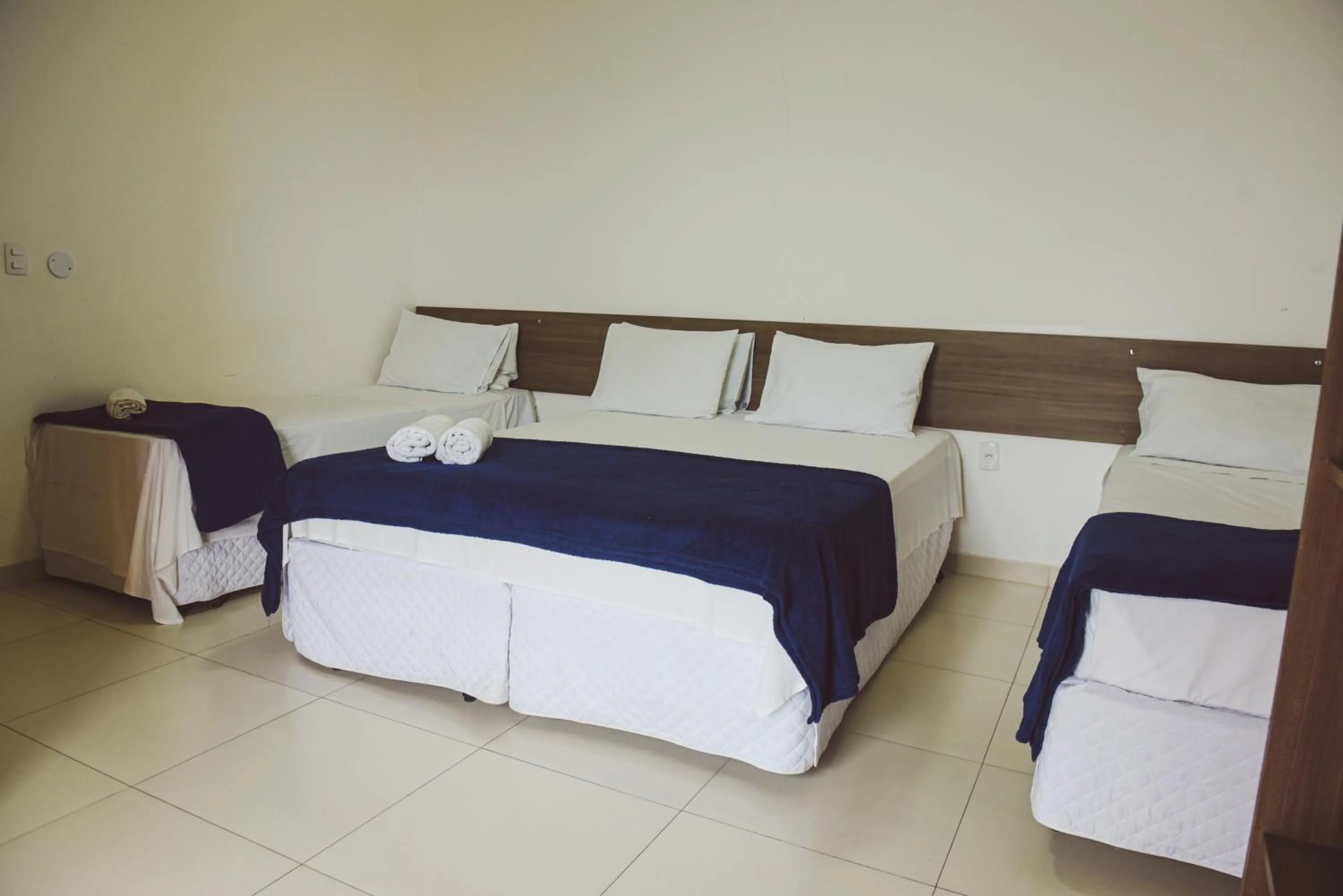 Bed in Pousada Xerxes