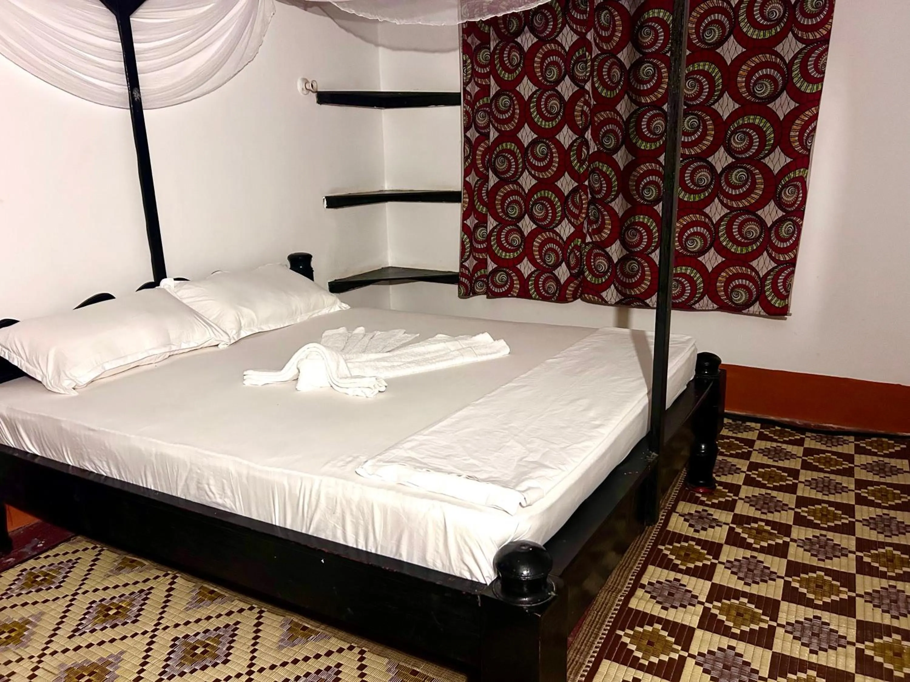 Bed in The Tropinest bungalow