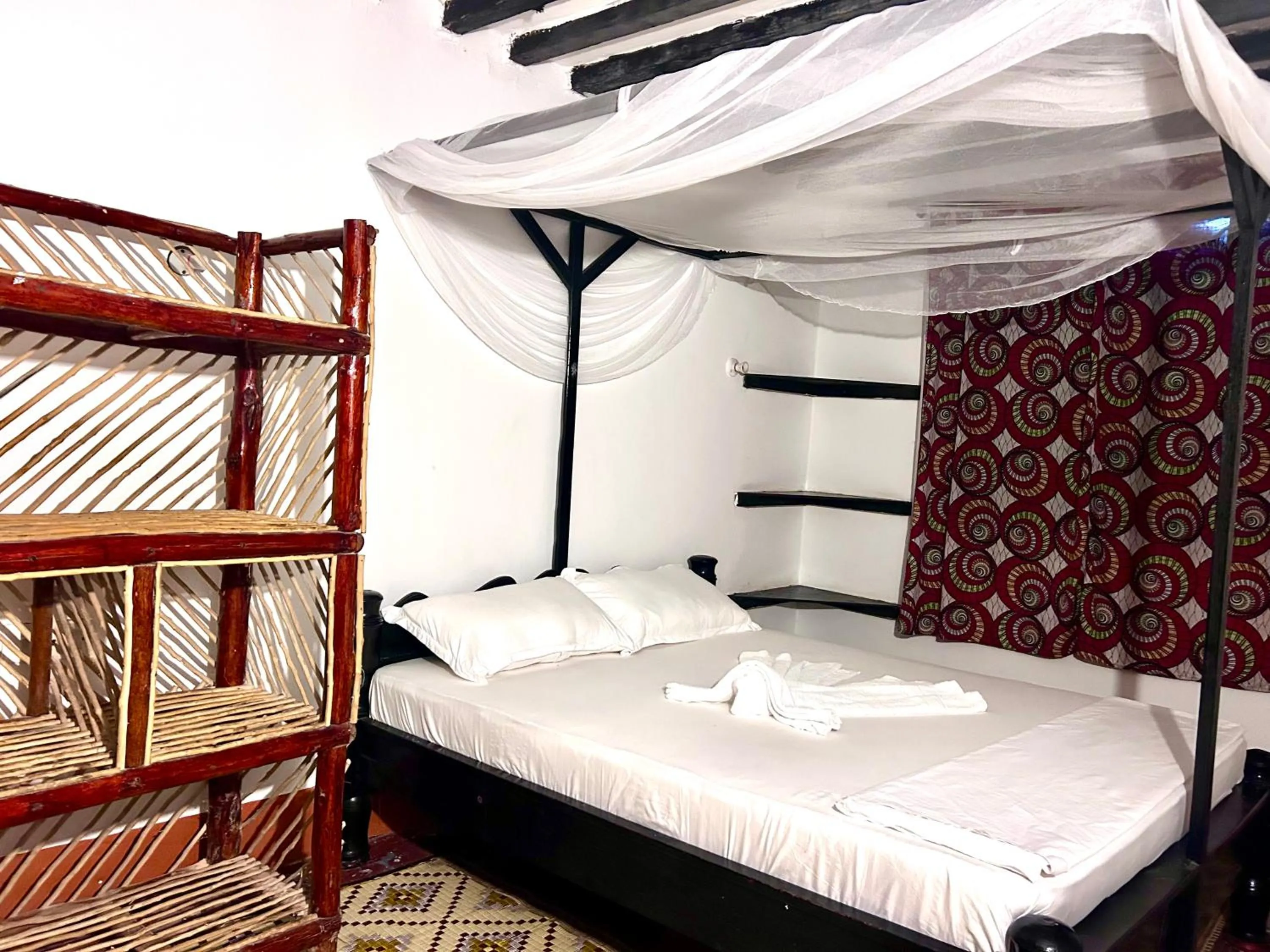 Bed in The Tropinest bungalow