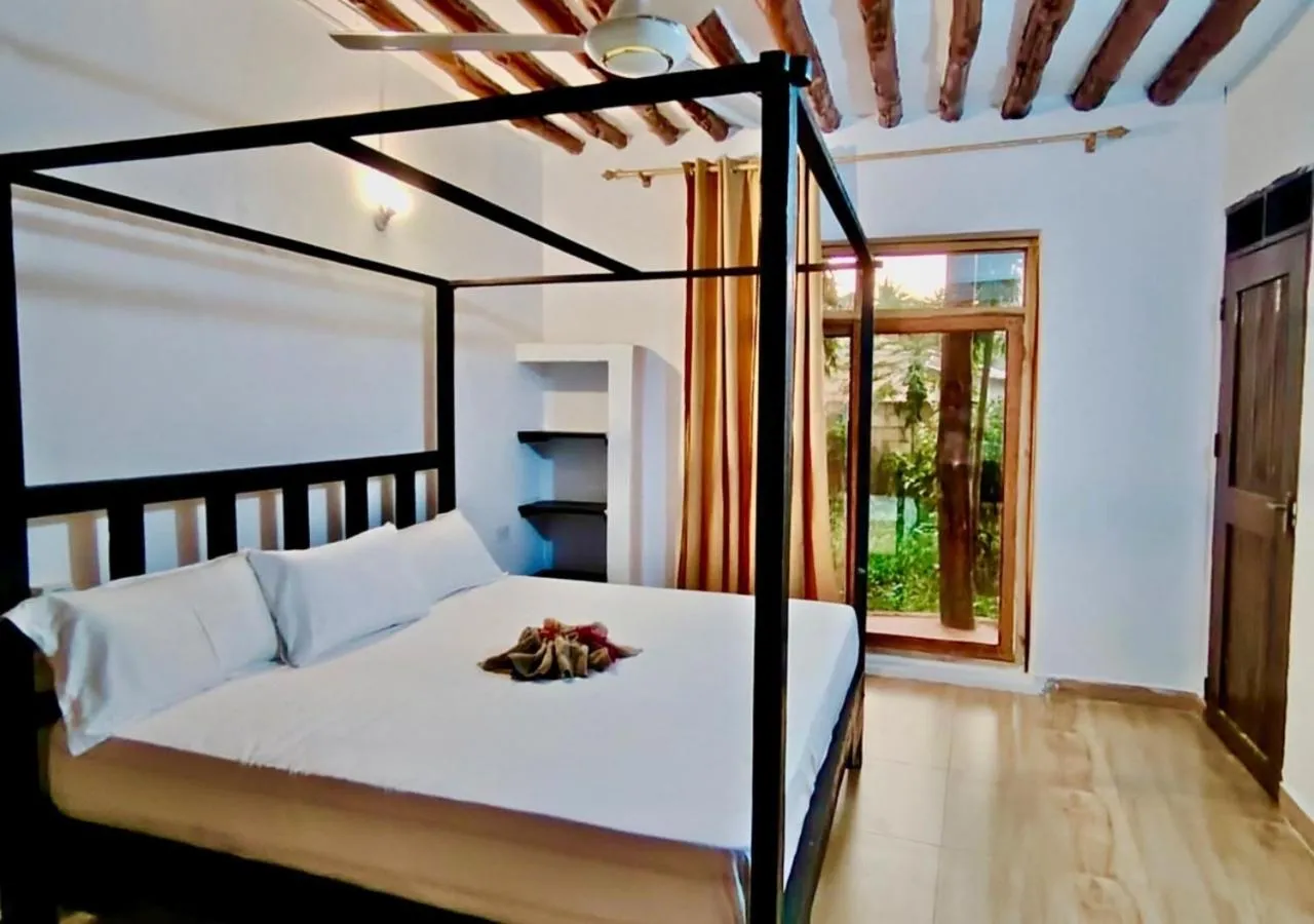 Bed in The Tropinest bungalow