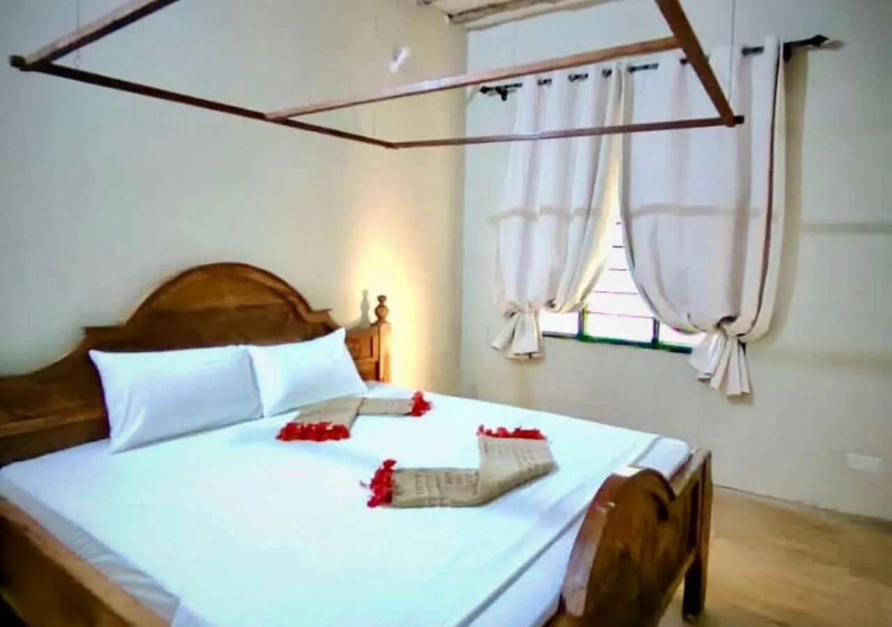 Bed in The Tropinest bungalow