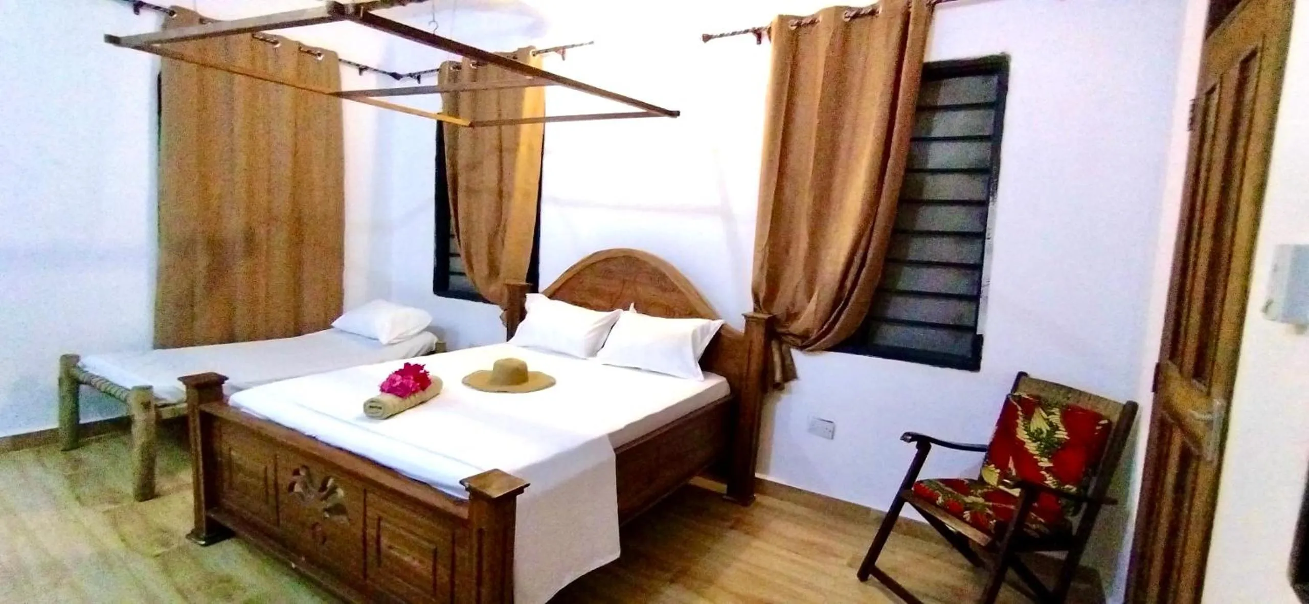 Bed in The Tropinest bungalow