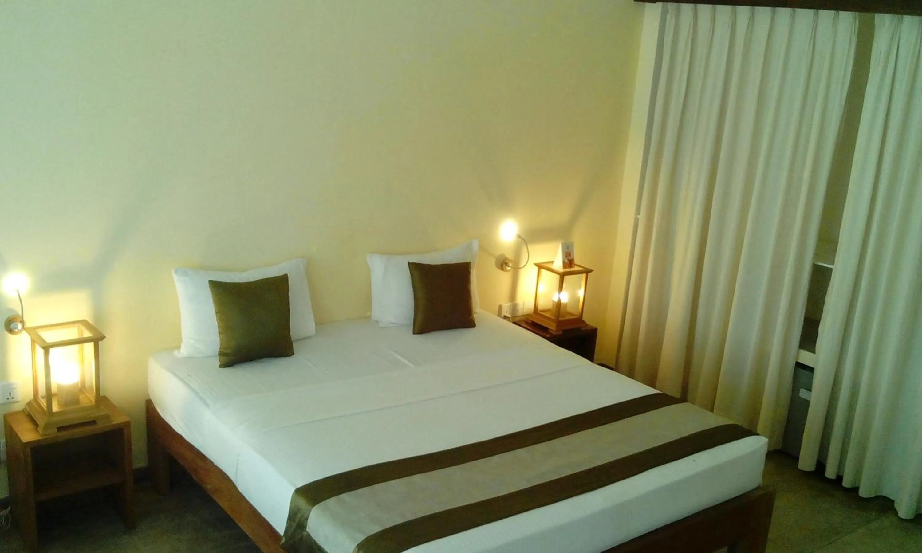 View (from property/room), Bed in Giman Free Beach Resort Pasikuda