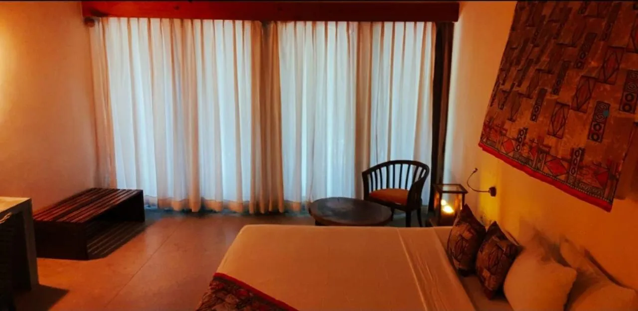 Dining area, Bed in Giman Free Beach Resort Pasikuda