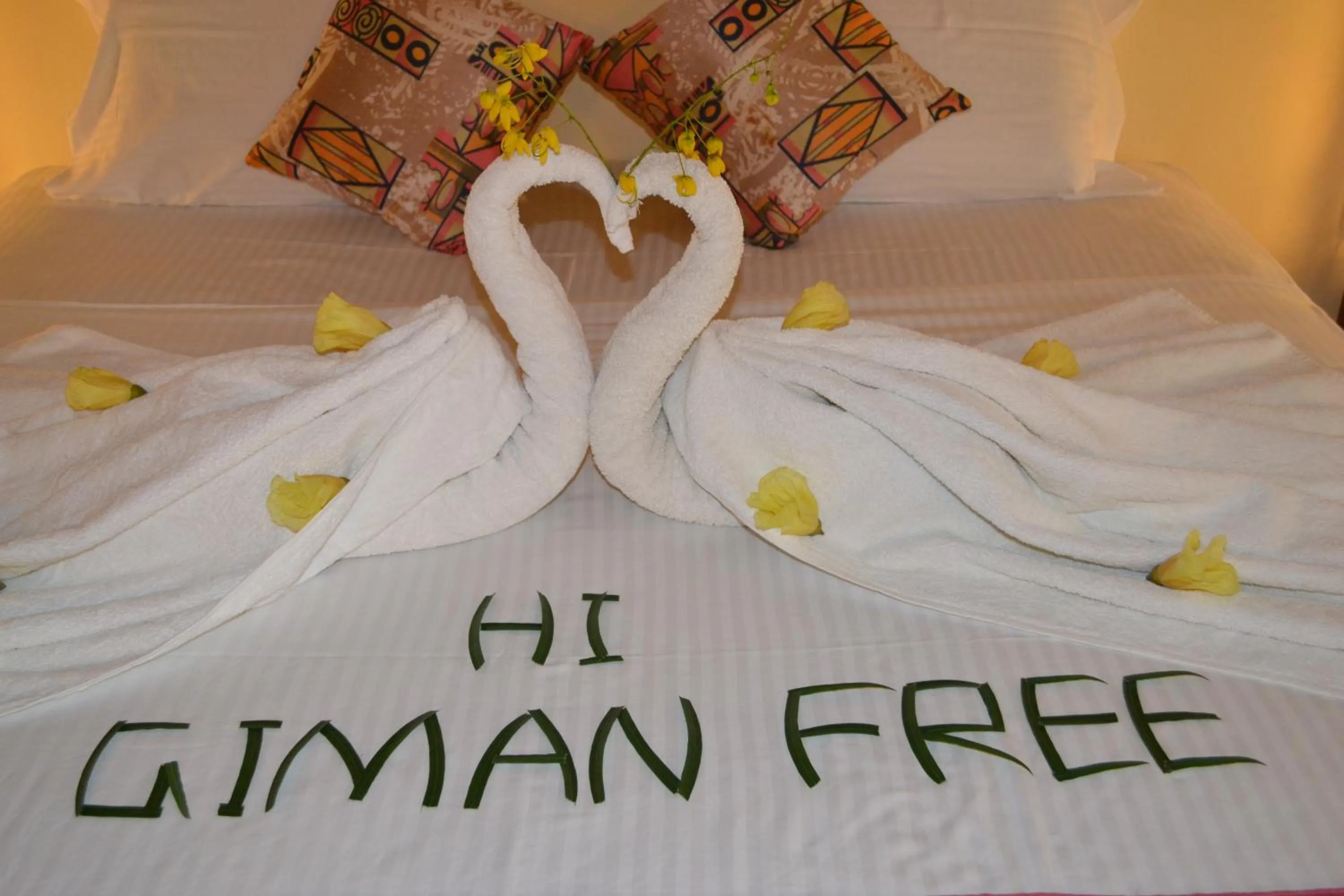 Bed in Giman Free Beach Resort Pasikuda