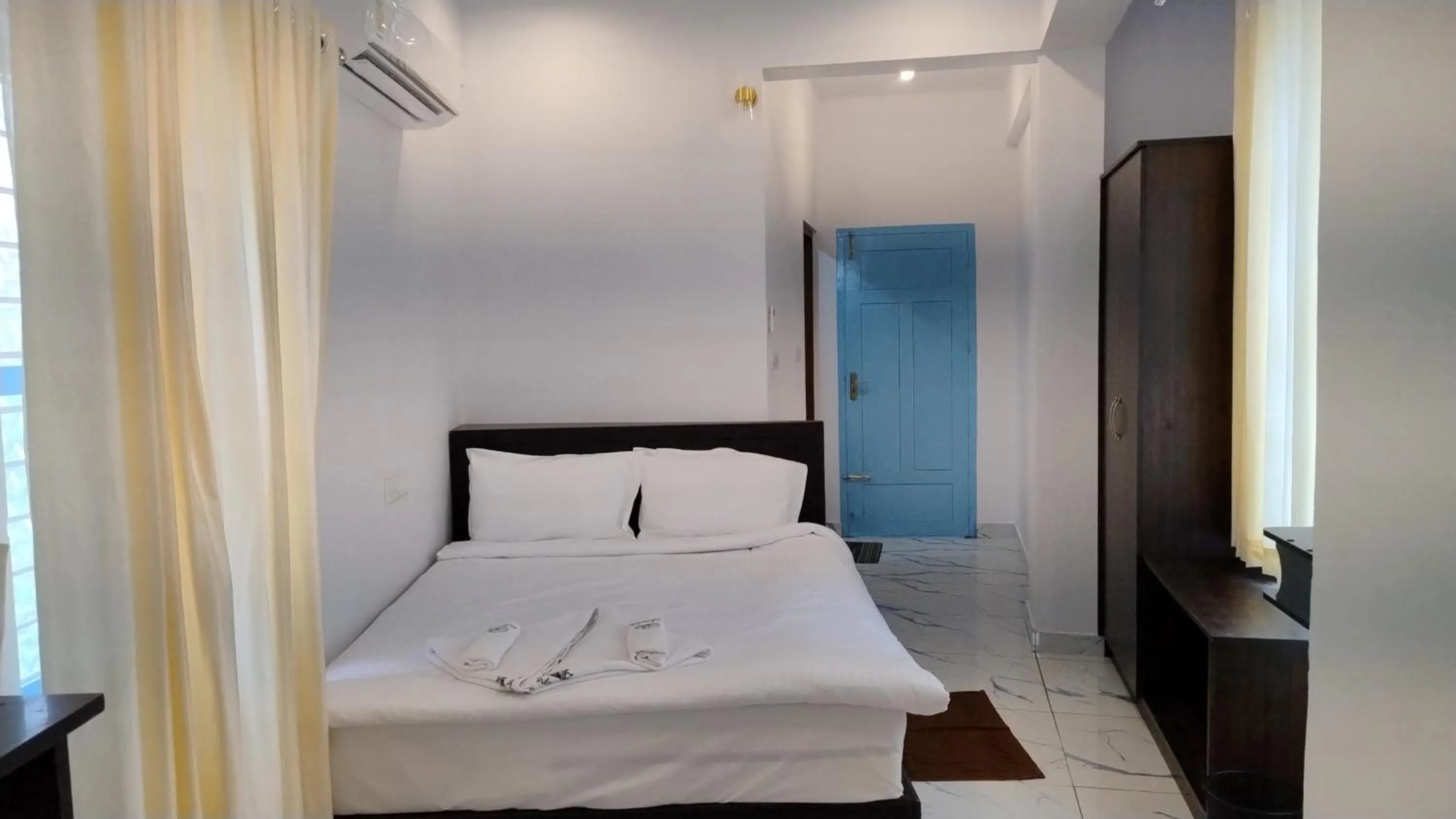 Bed in Gulmohar Varkala