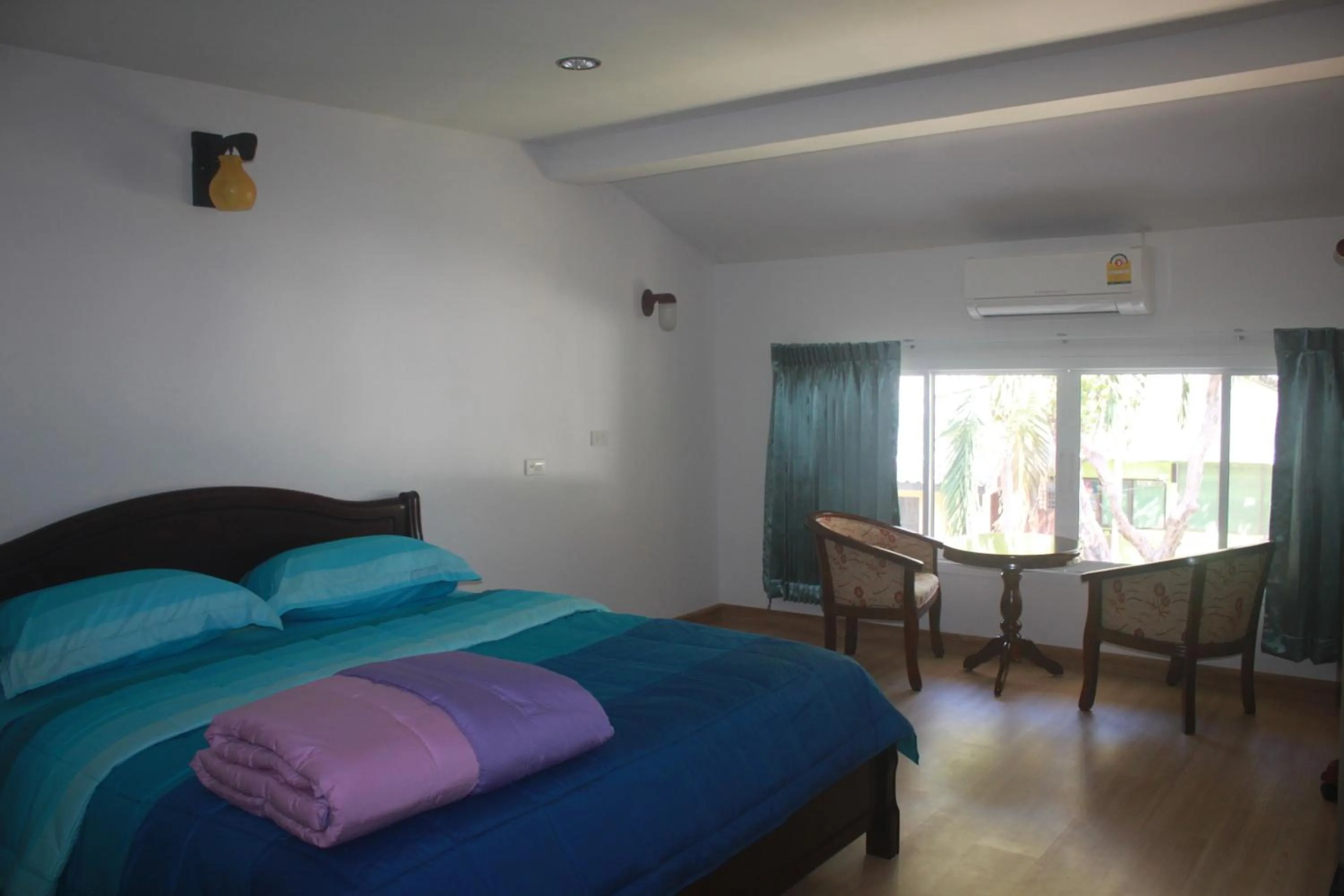 Day, Bed in Nong Nuey Rooms