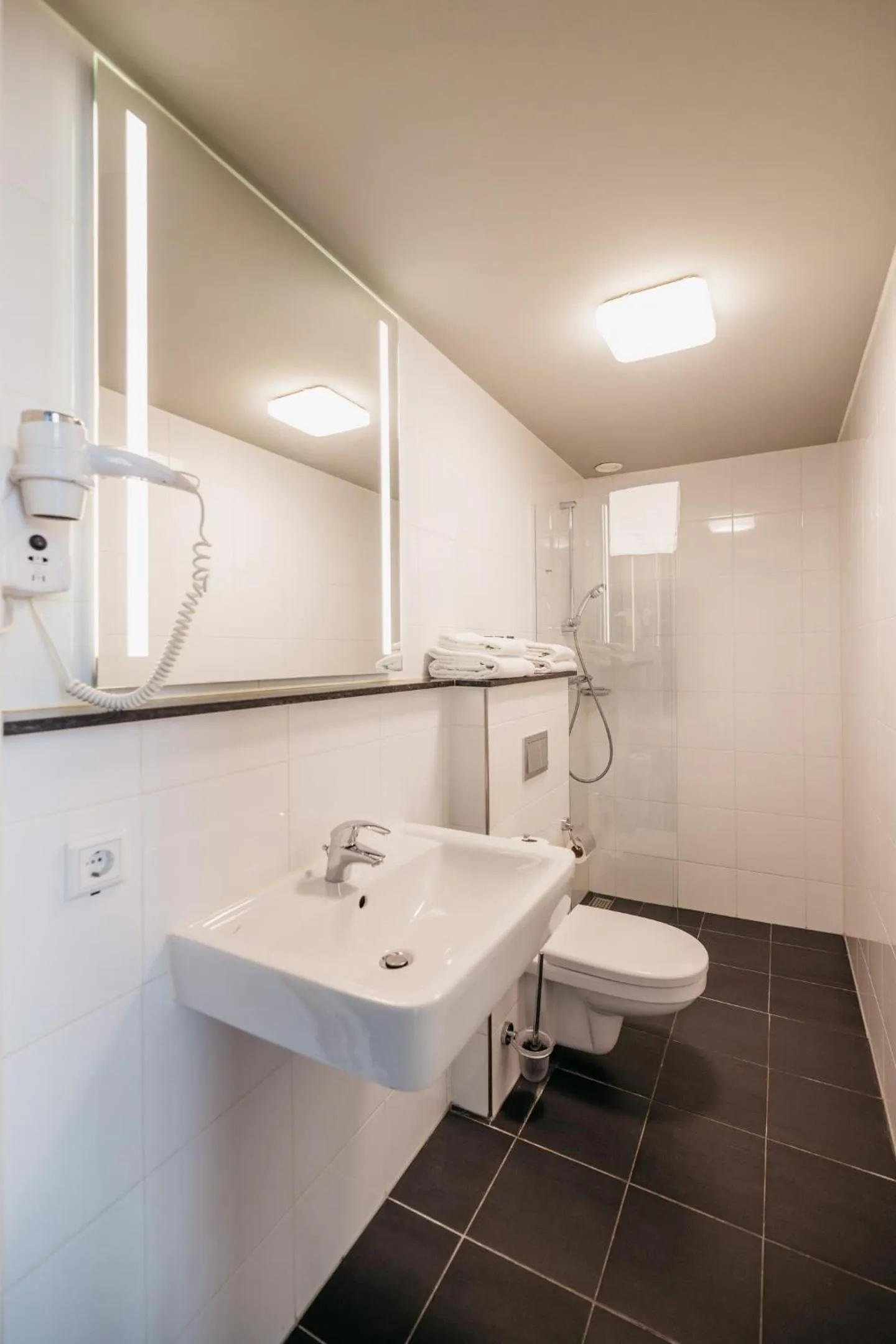 Bathroom in YAYS Amsterdam Maritime by Numa