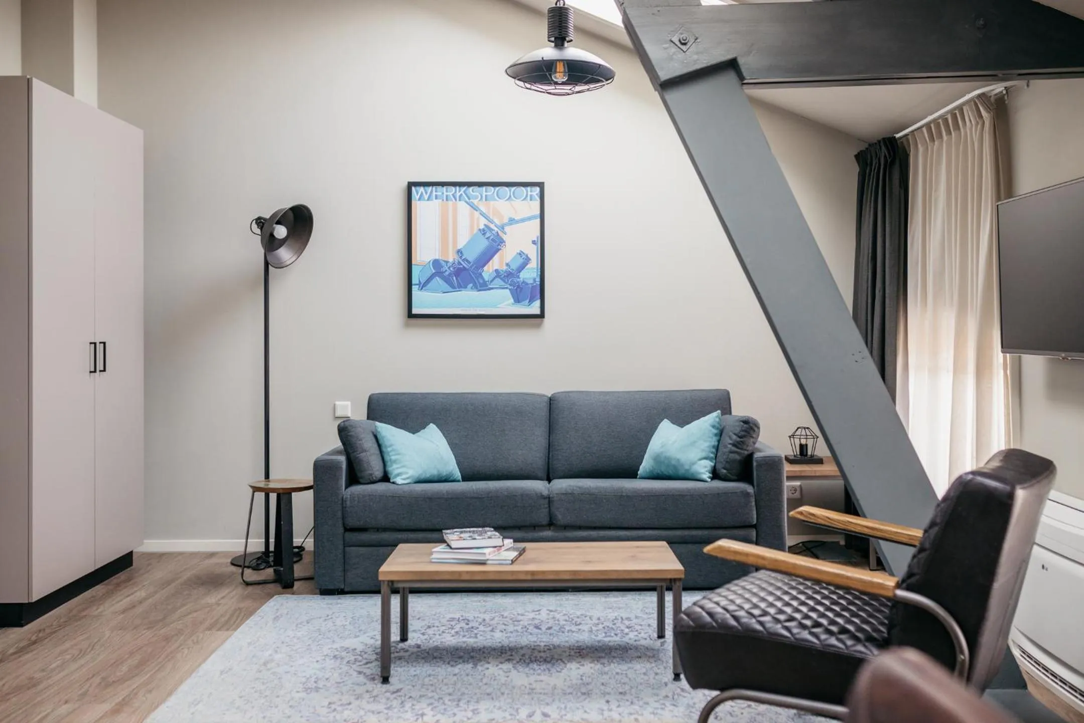 Seating area in YAYS Amsterdam Maritime by Numa