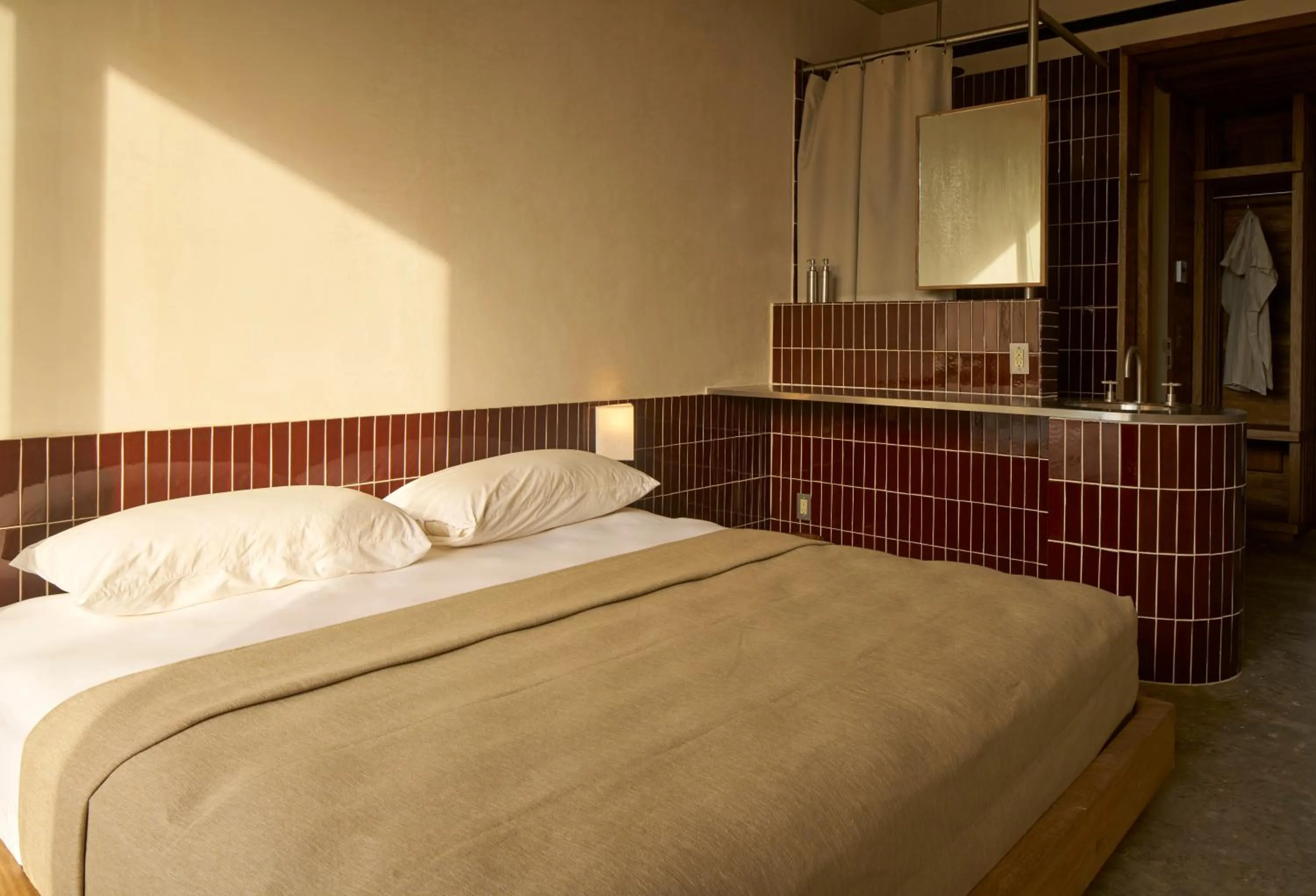 Bed in Hotel Humano, a Member of Design Hotels