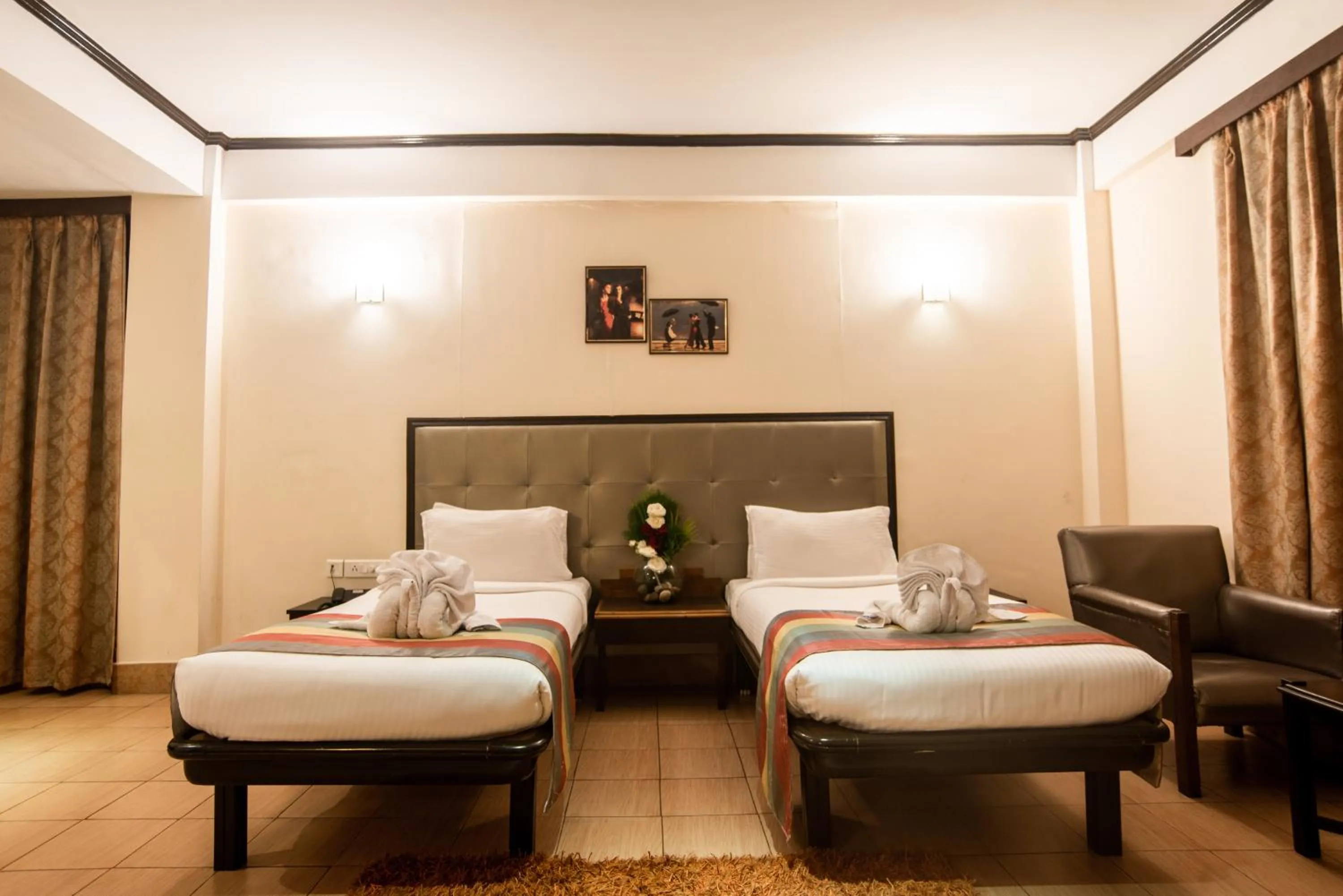 Toilet, Bed in Polo Tura Hotel