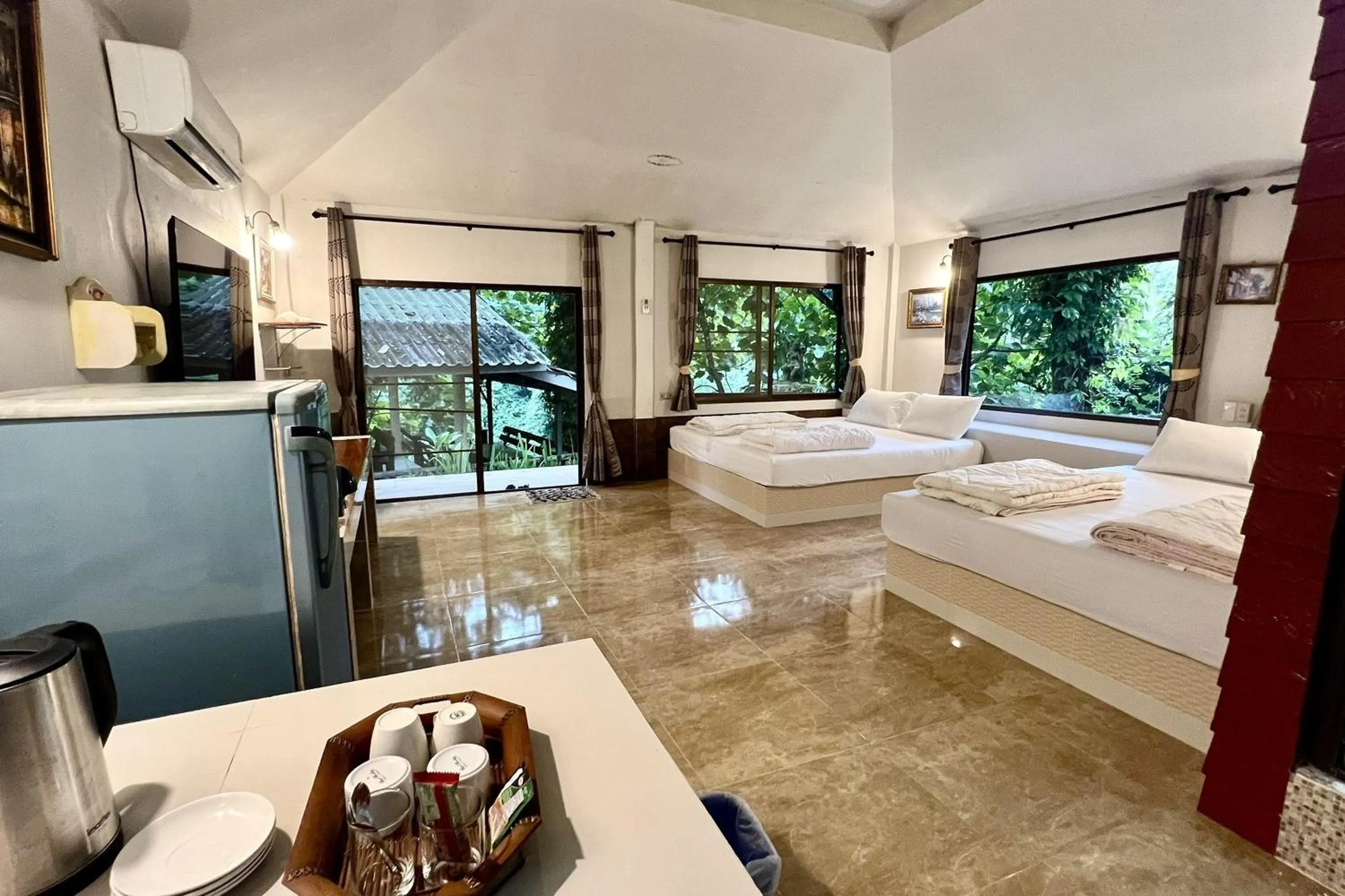 Bed in The Cascade - Mae Taeng Waterfall Bungalows