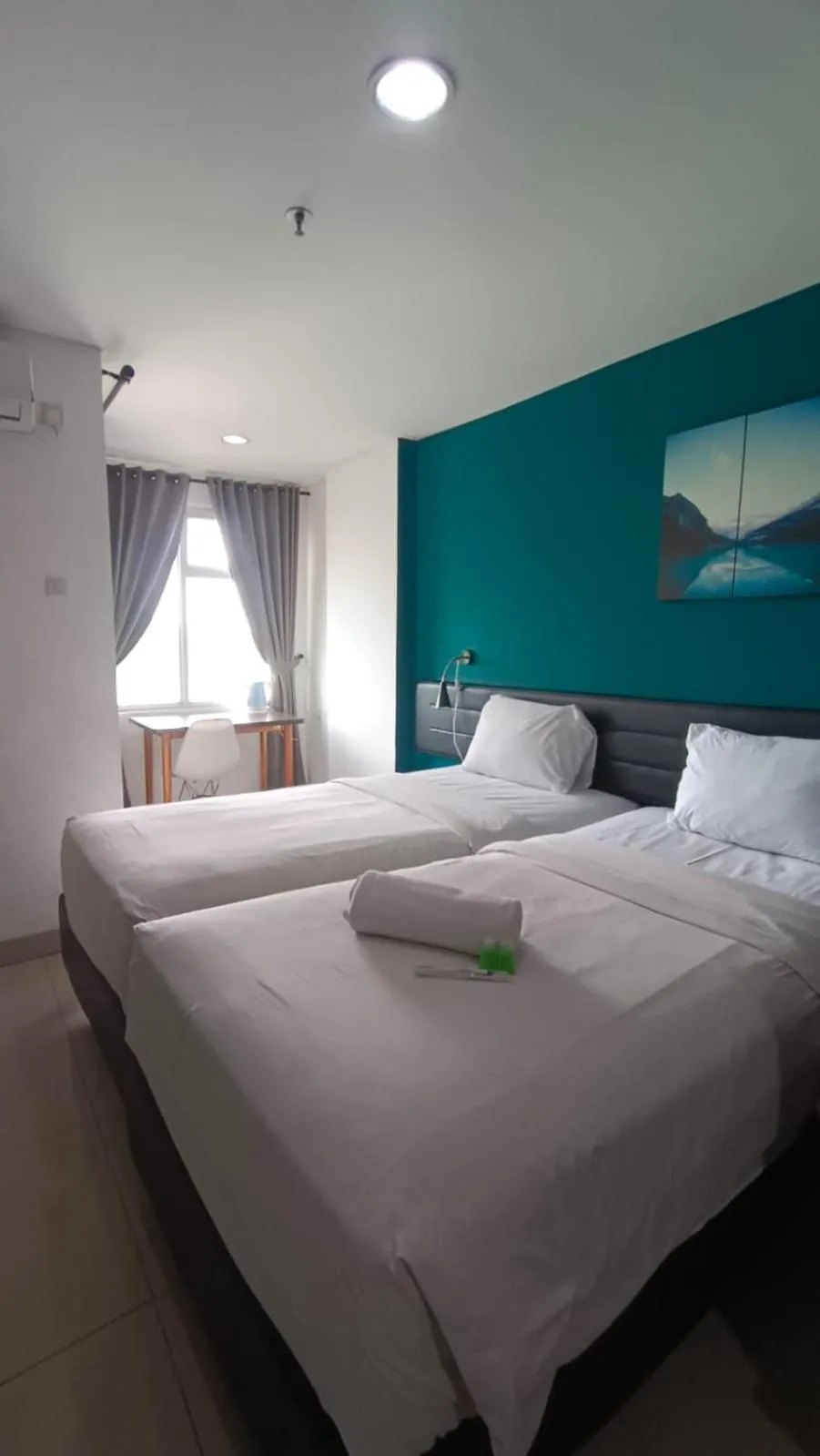 Bed in Izi Cozi Kemayoran Powered by Archipelago