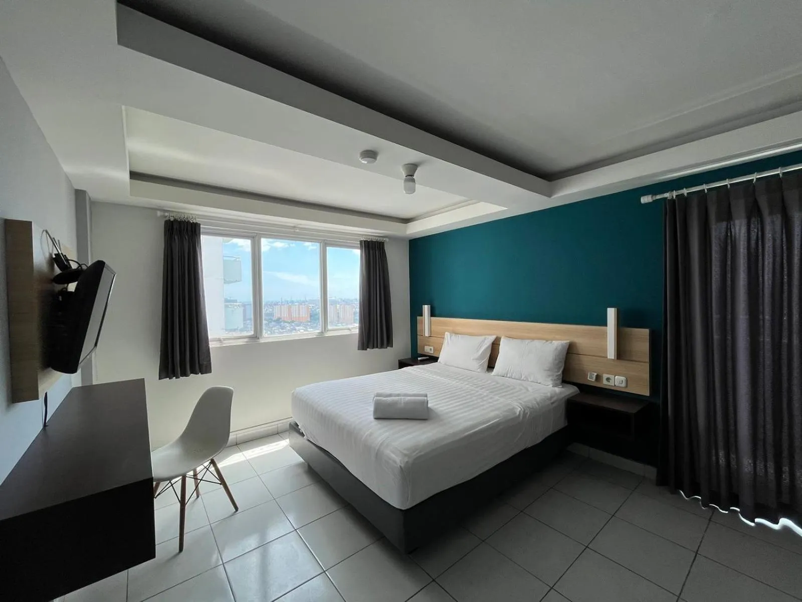 Bed in Izi Cozi Kemayoran Powered by Archipelago