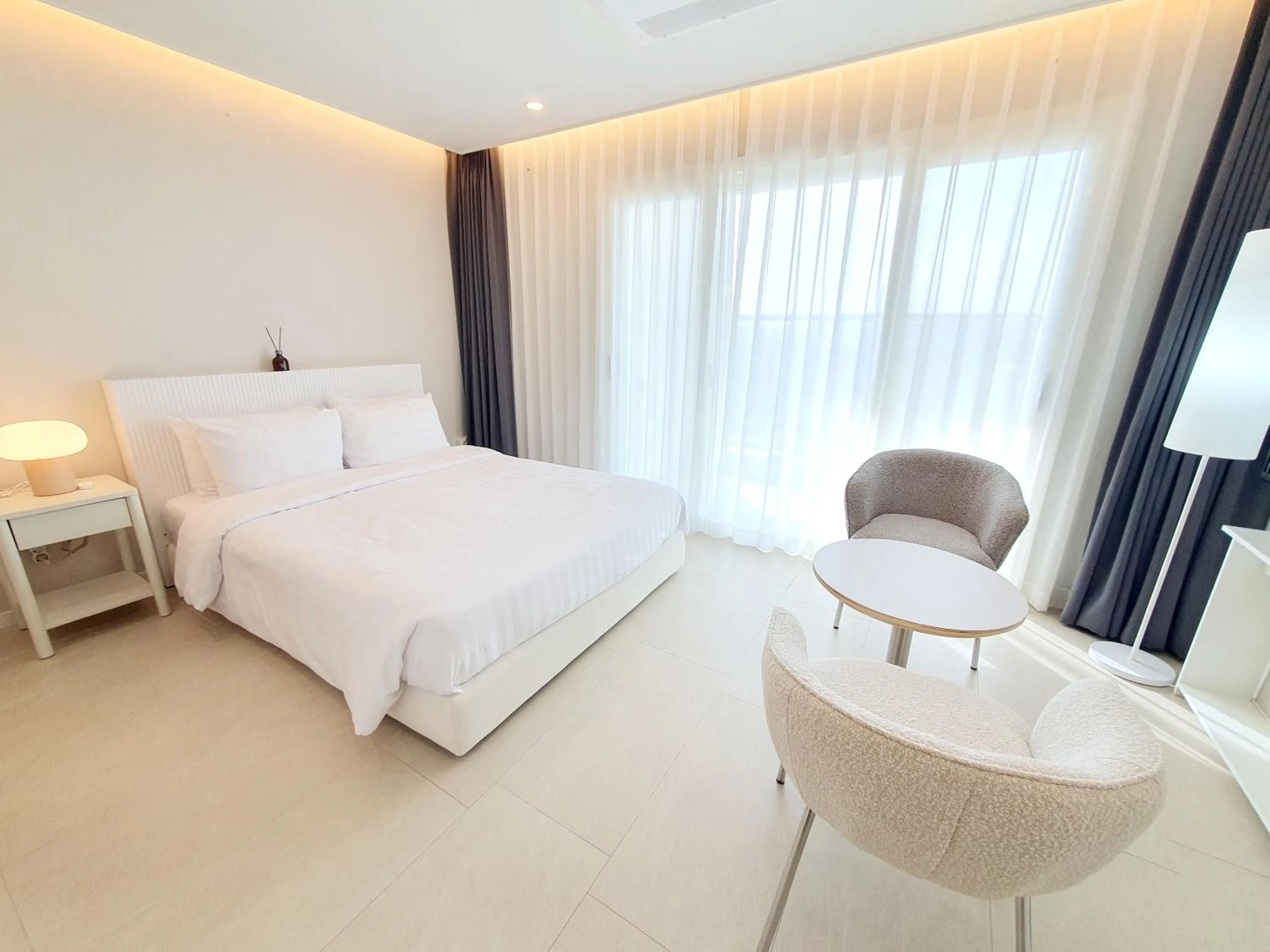 Bed in Le Bleu Naksan by Orot