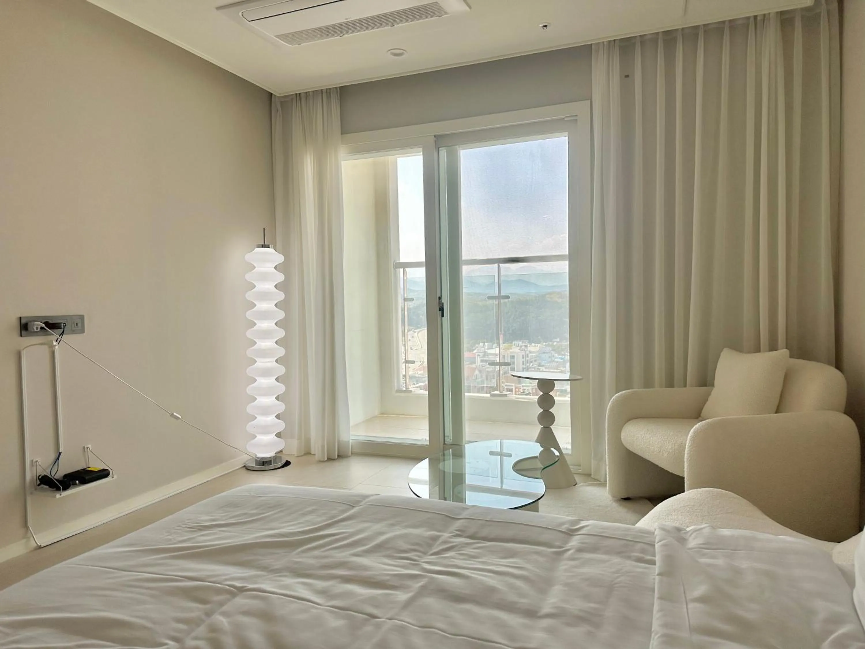 Bed in Le Bleu Naksan by Orot