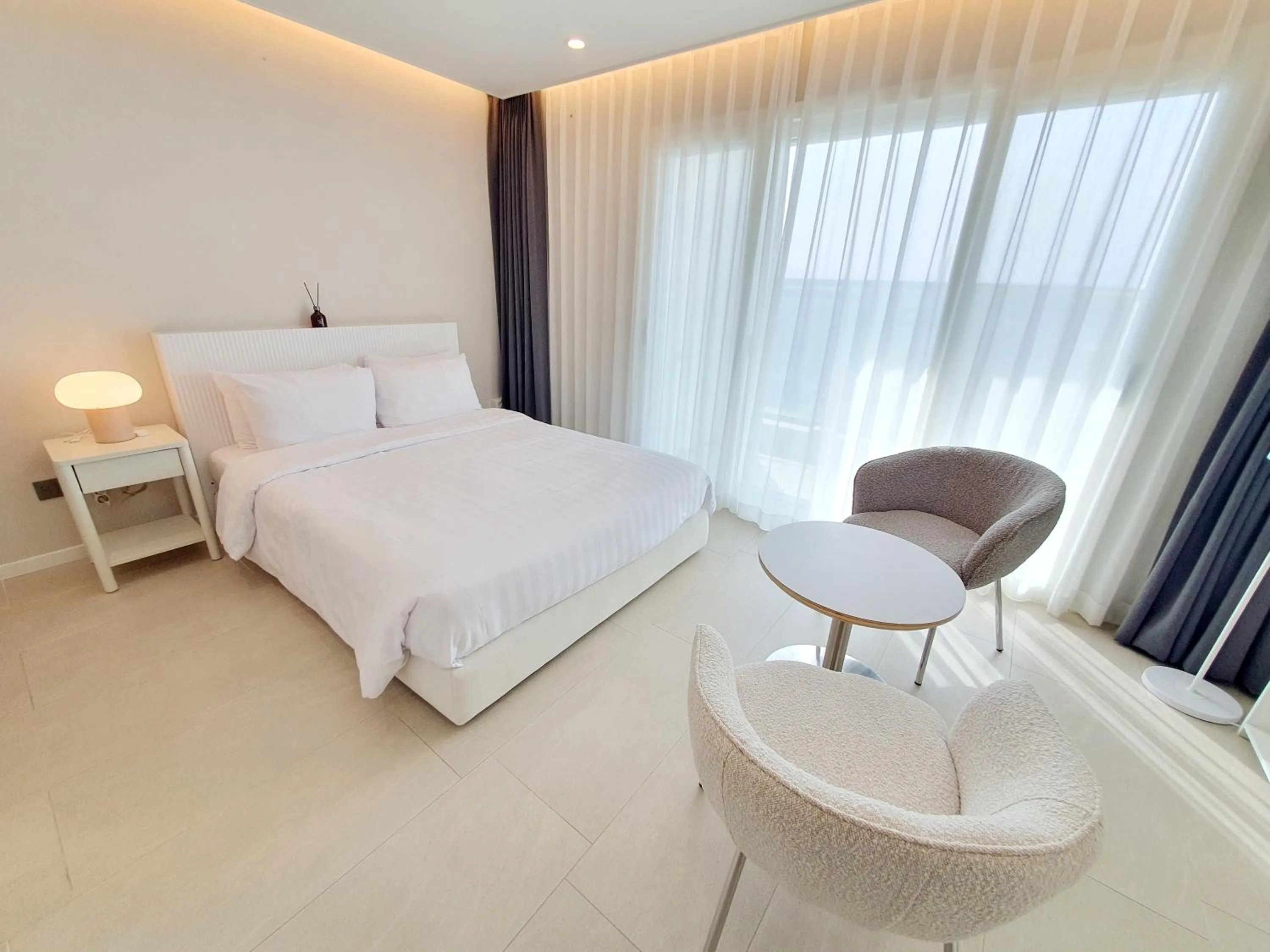 Bed in Le Bleu Naksan by Orot