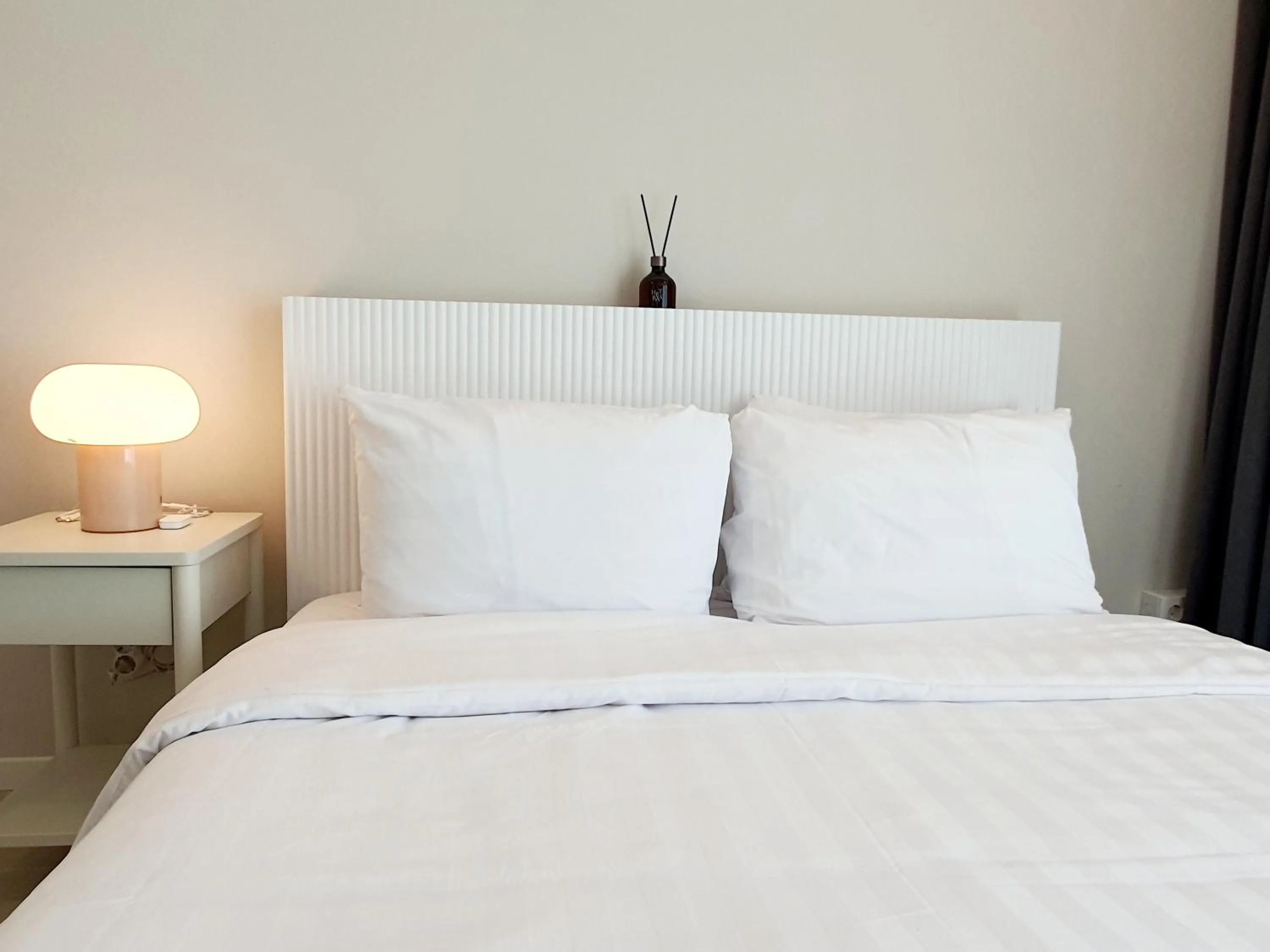 Bed in Le Bleu Naksan by Orot