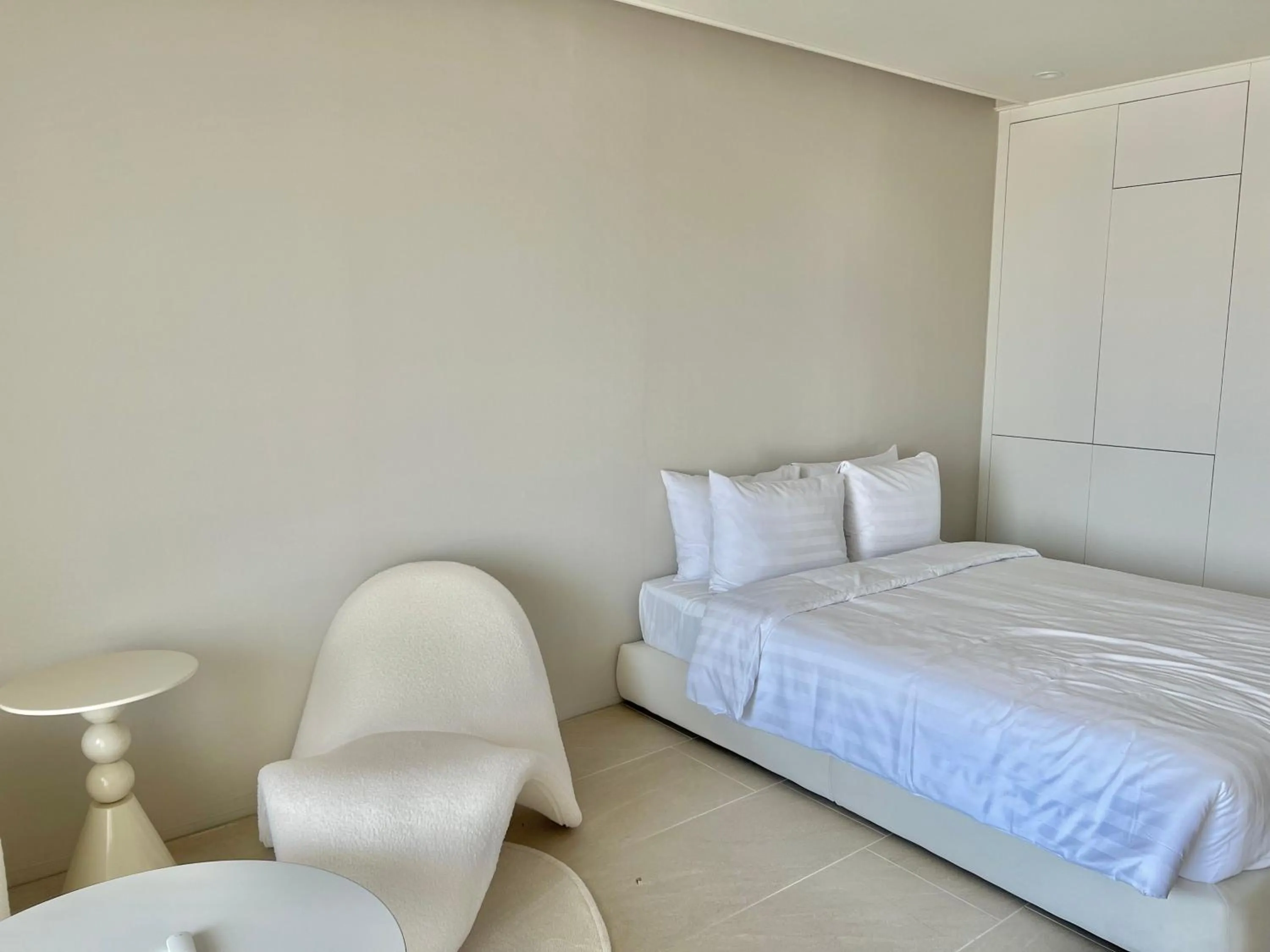 Bed in Le Bleu Naksan by Orot