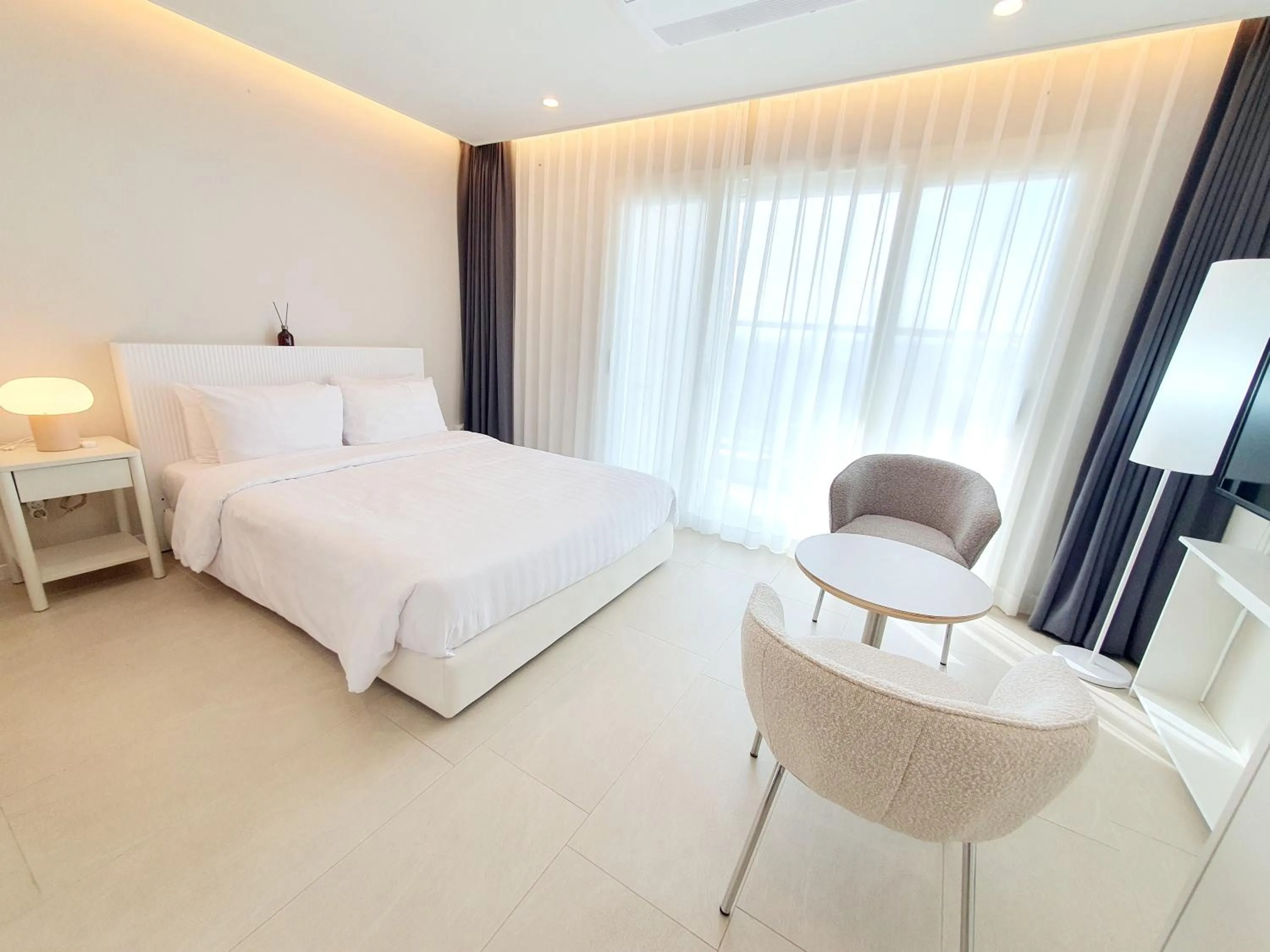 Bed in Le Bleu Naksan by Orot