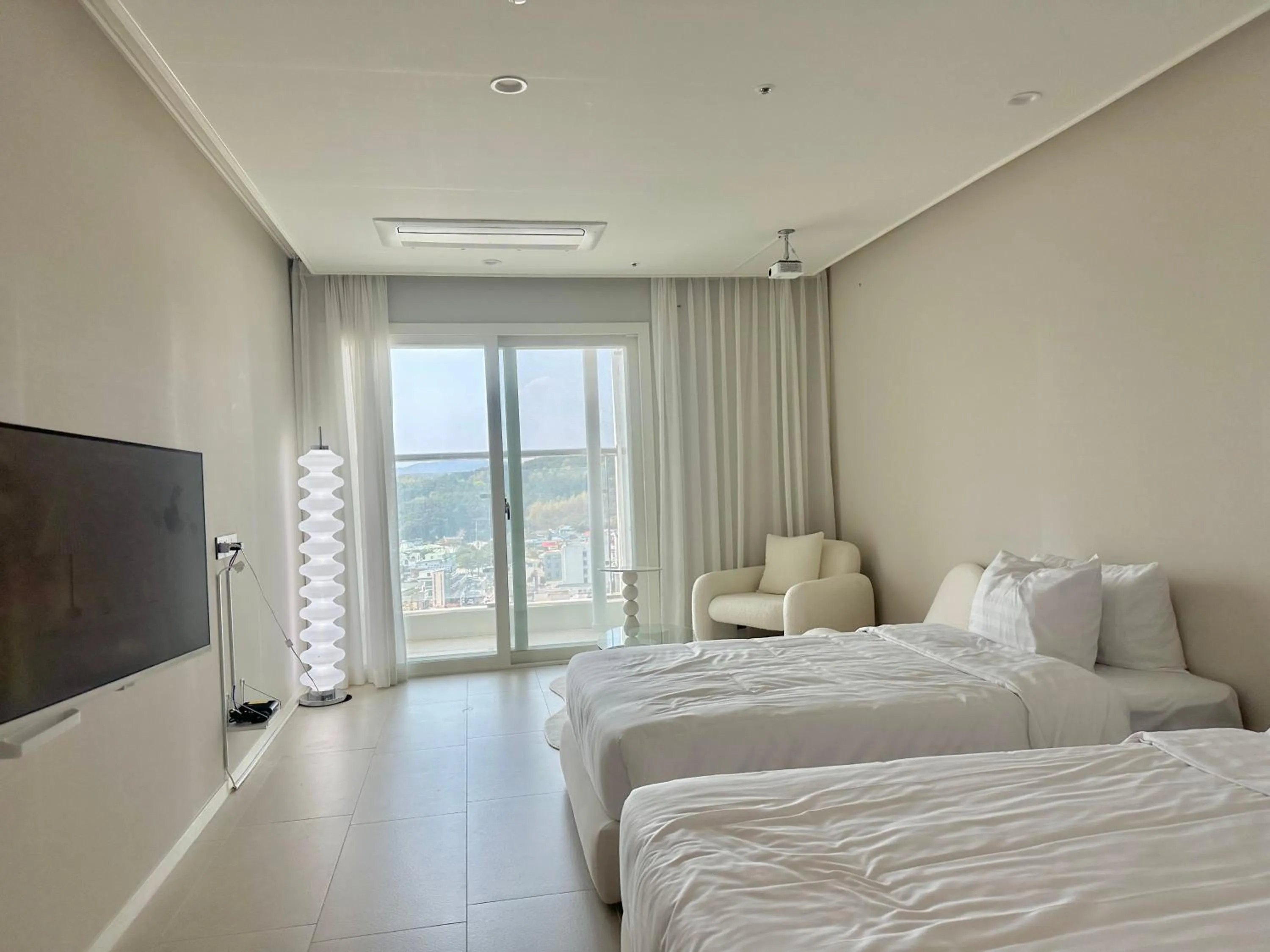 Bed in Le Bleu Naksan by Orot