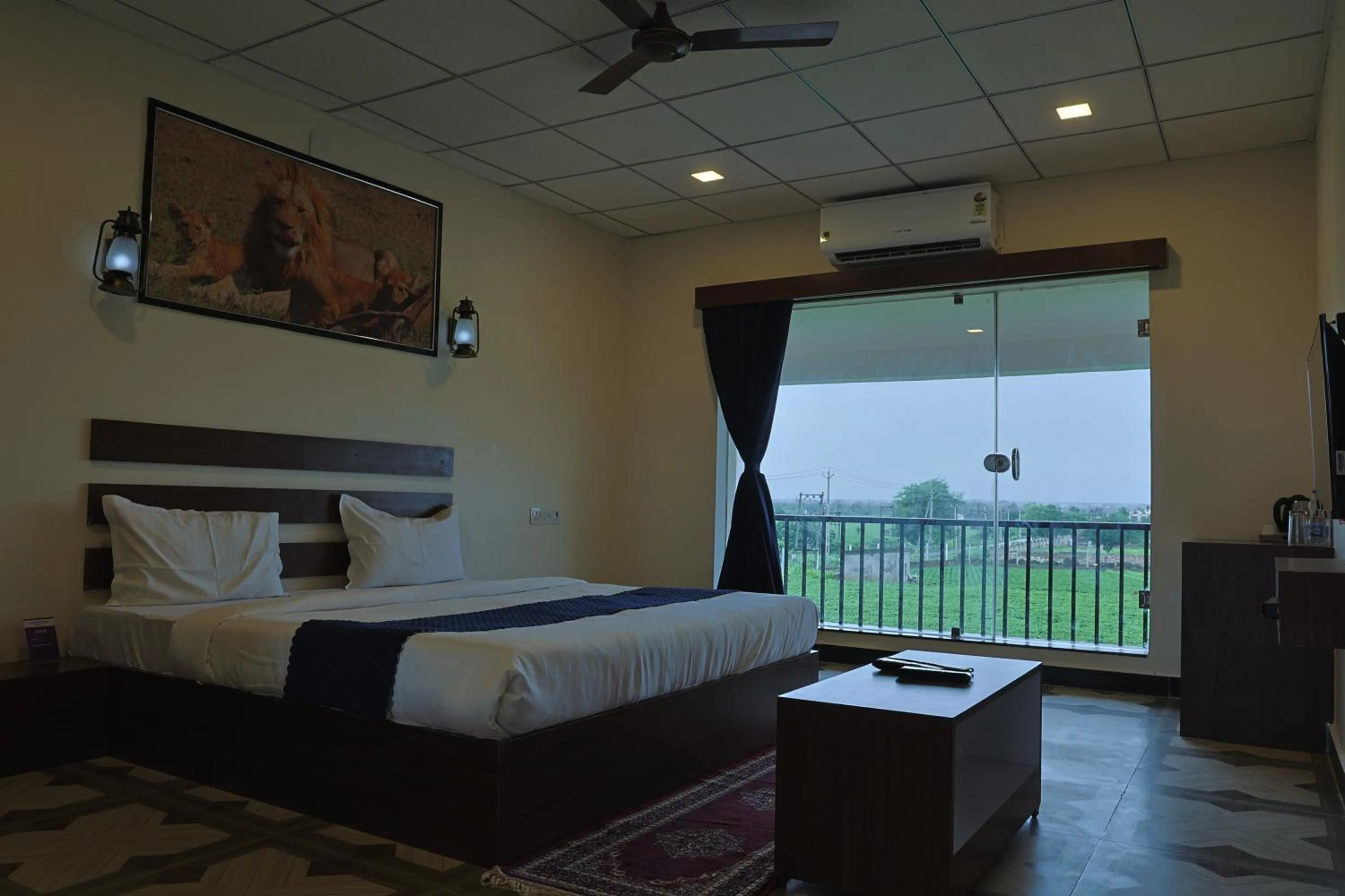 View (from property/room), Bed in VITS Select Diamond Resort Sasan Gir