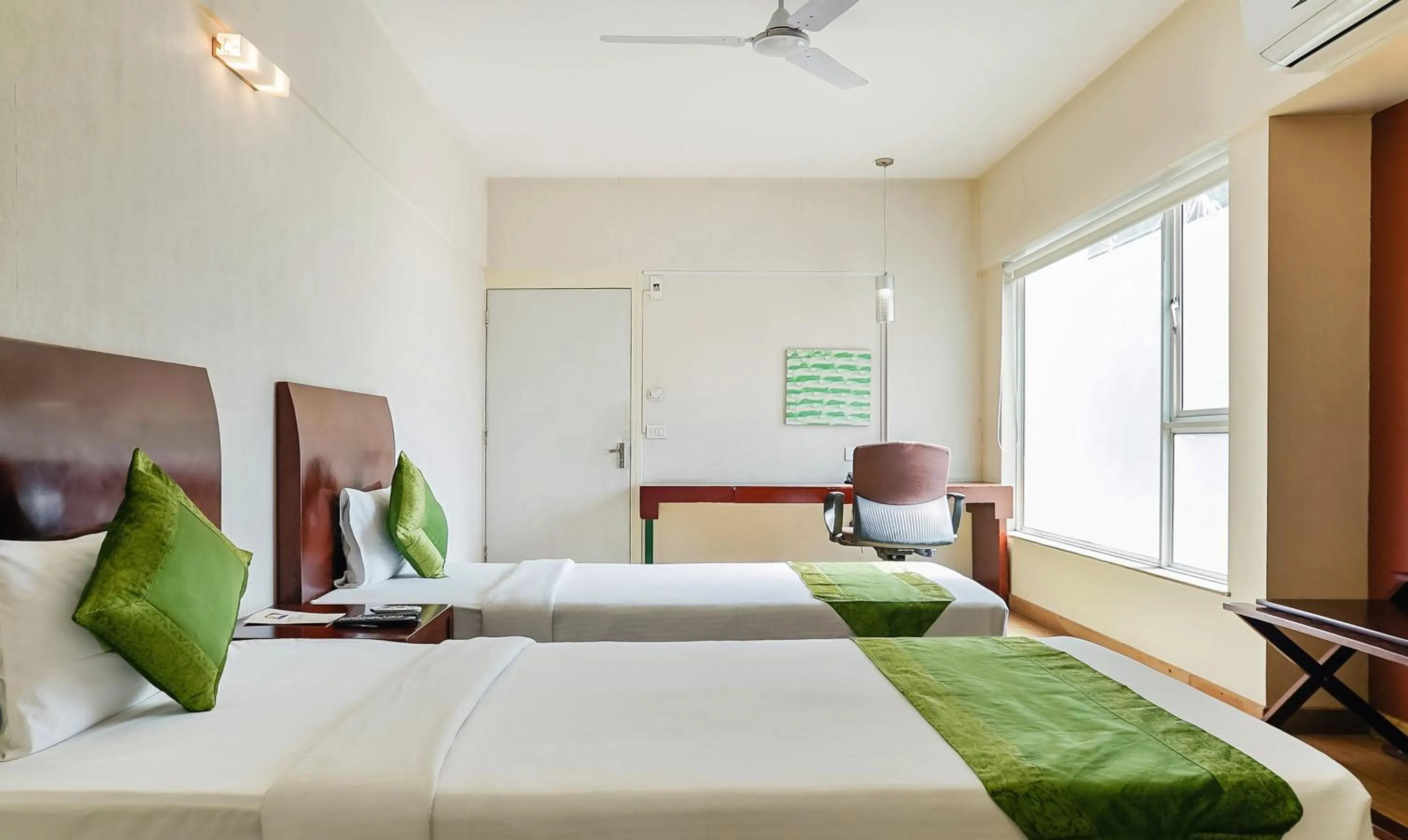 Bedroom, Bed in Treebo Brooks Manor