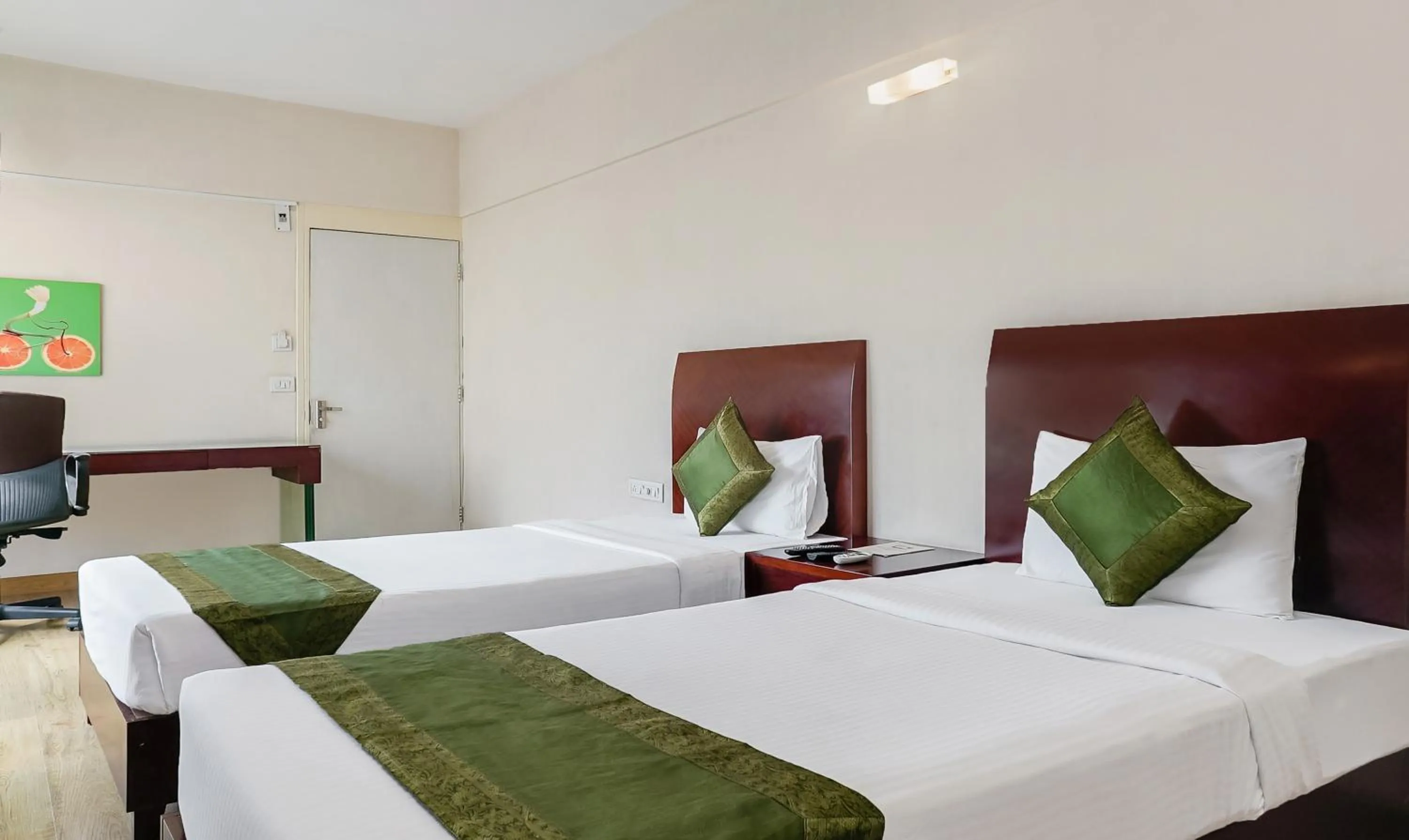 Bedroom, Bed in Treebo Brooks Manor